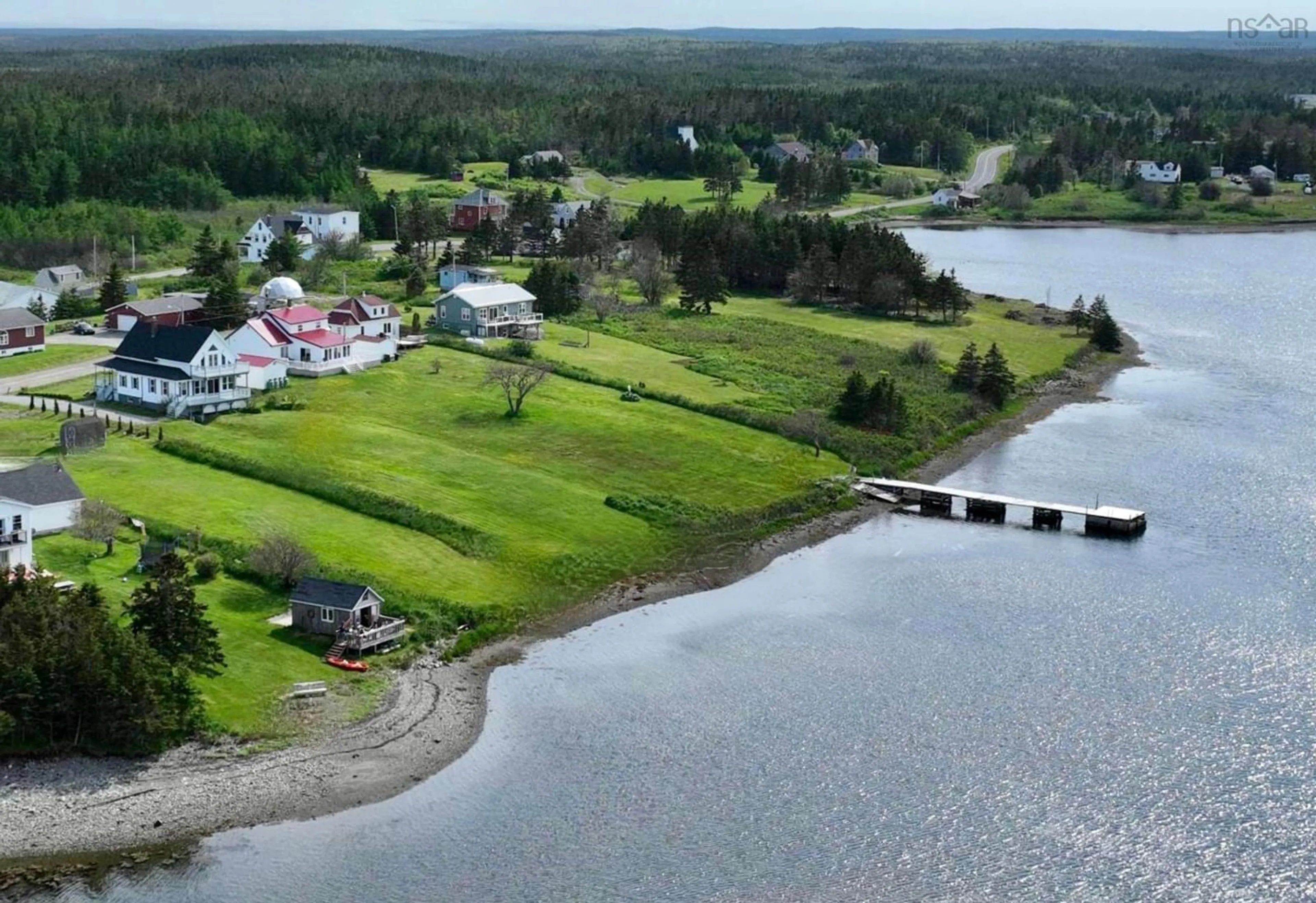 A pic from outside/outdoor area/front of a property/back of a property/a pic from drone, water/lake/river/ocean view for 36 Seaview Dr, Gabarus Village Nova Scotia B1K 3T4