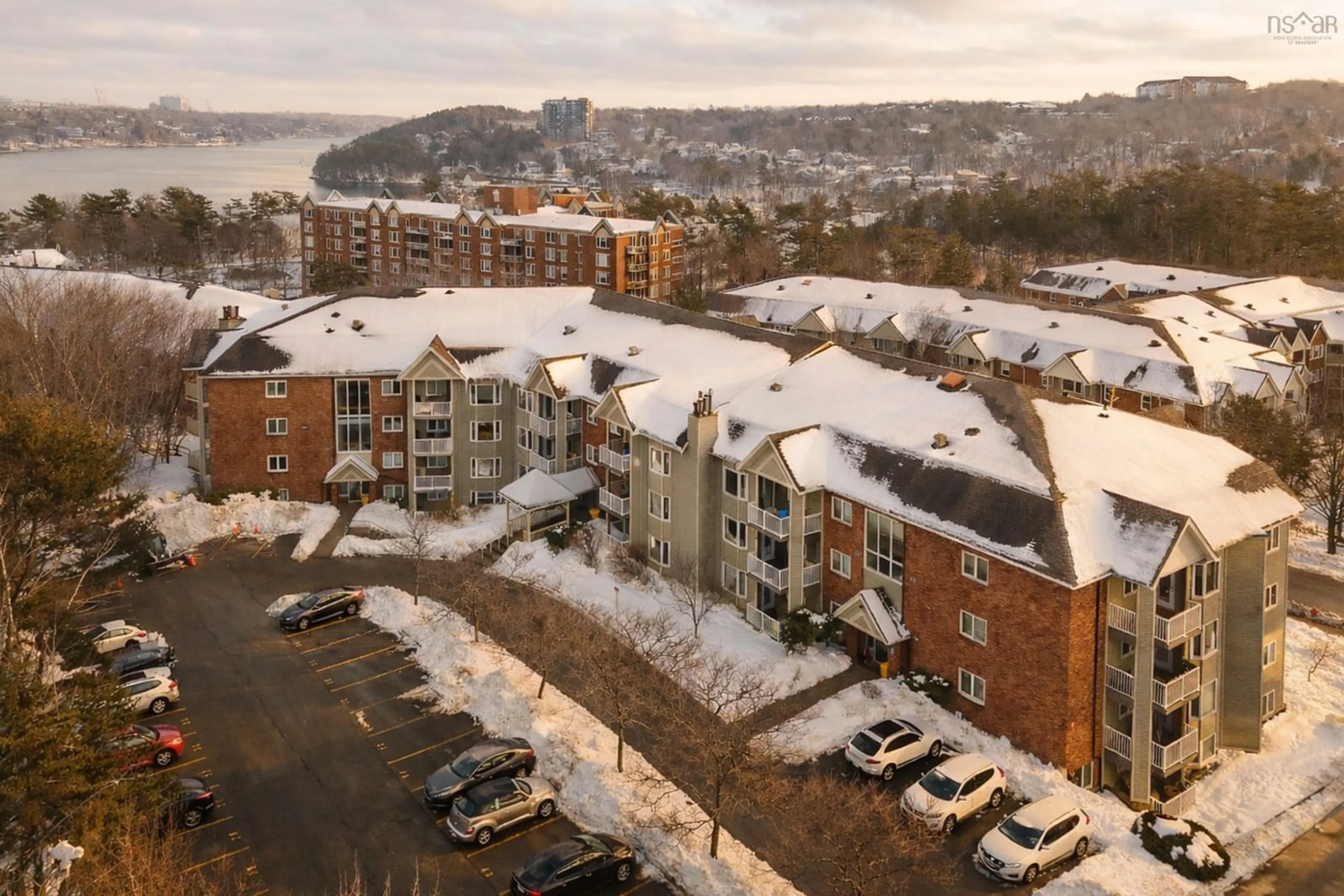 A pic from outside/outdoor area/front of a property/back of a property/a pic from drone, unknown for 12 Spinnaker Dr #211, Halifax Nova Scotia B3N 3A8
