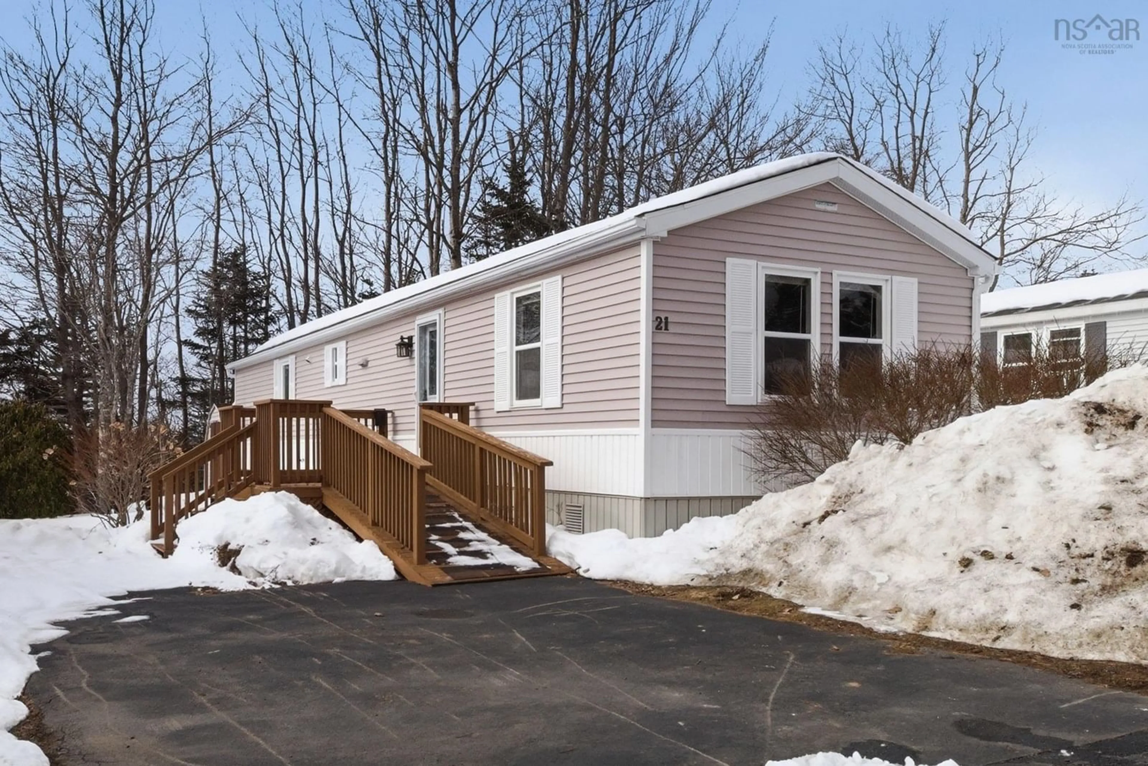 Home with vinyl exterior material, street for 21 Moore Dr, Middle Sackville Nova Scotia B4E 2Y5