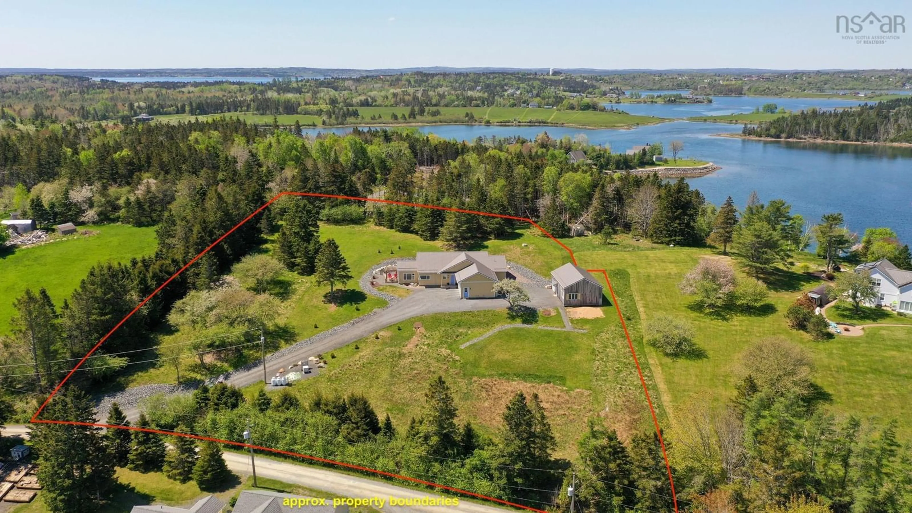 A pic from outside/outdoor area/front of a property/back of a property/a pic from drone, water/lake/river/ocean view for 207 Hebb Point Rd, Heckmans Island Nova Scotia B0J 2C0