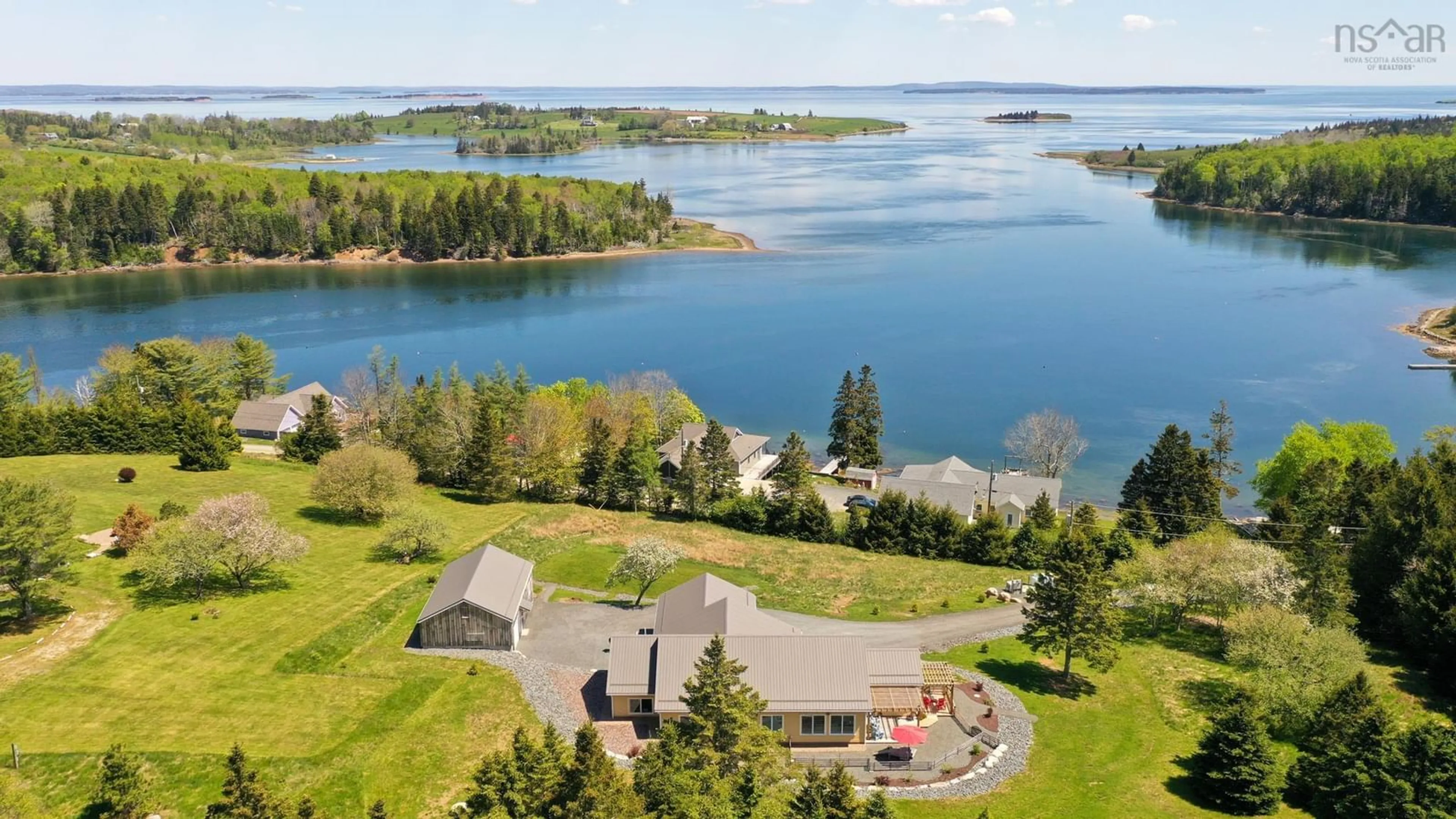 A pic from outside/outdoor area/front of a property/back of a property/a pic from drone, water/lake/river/ocean view for 207 Hebb Point Rd, Heckmans Island Nova Scotia B0J 2C0