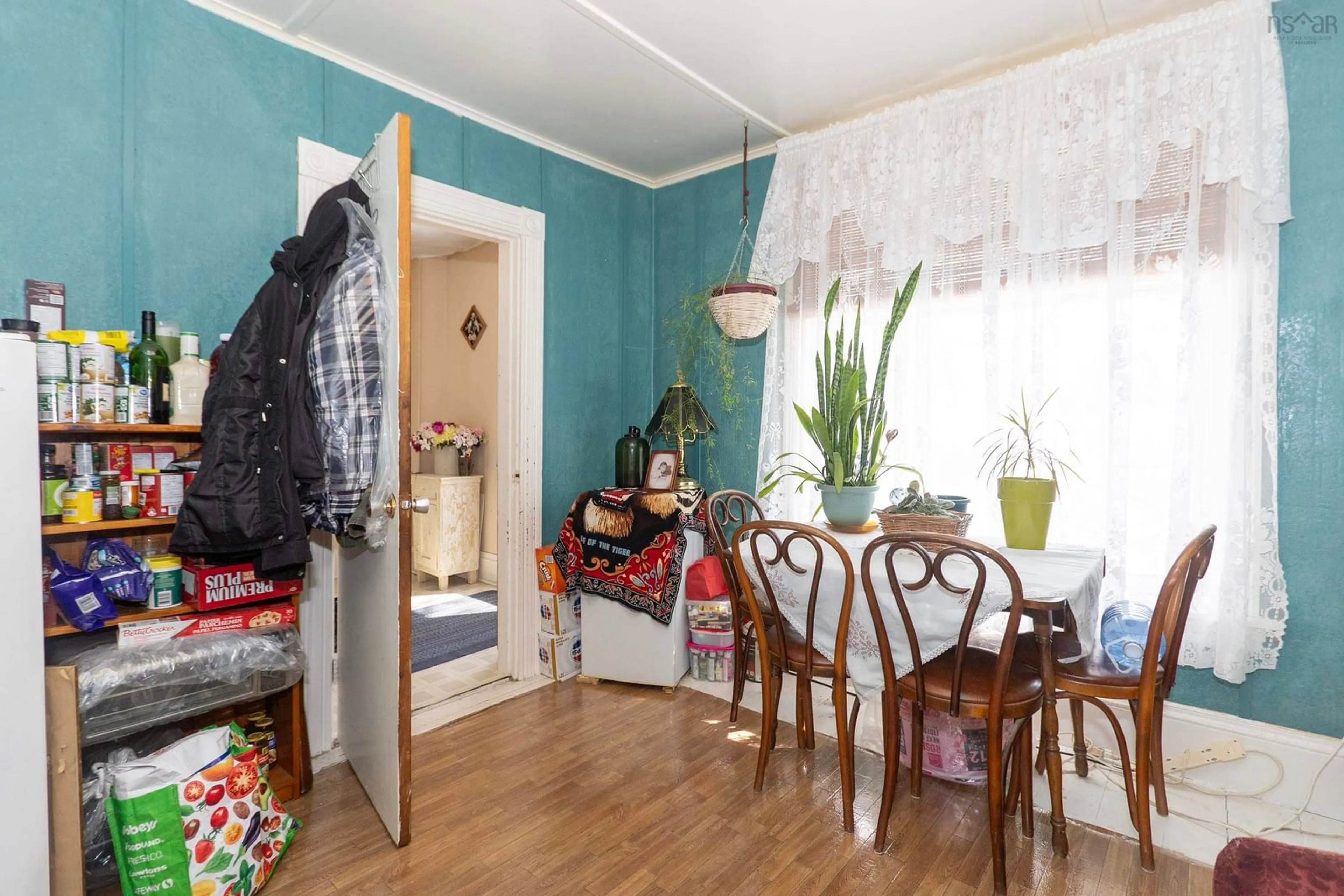 Dining room, wood/laminate floor for 10 Patterson St, Amherst Nova Scotia B4H 1G7