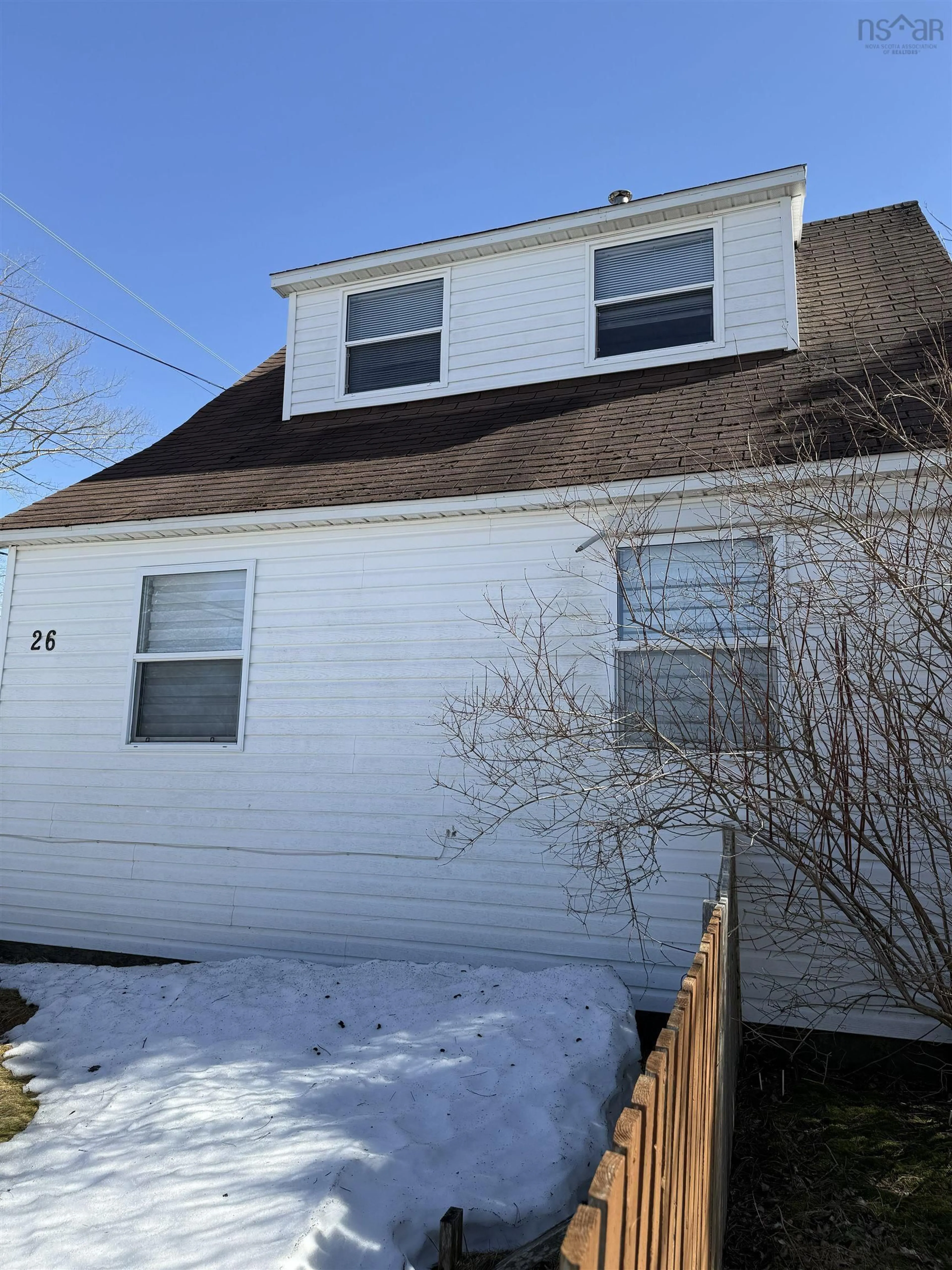 Home with vinyl exterior material, street for 26 Sydney Rd, Port Hawkesbury Nova Scotia B9A 3A4