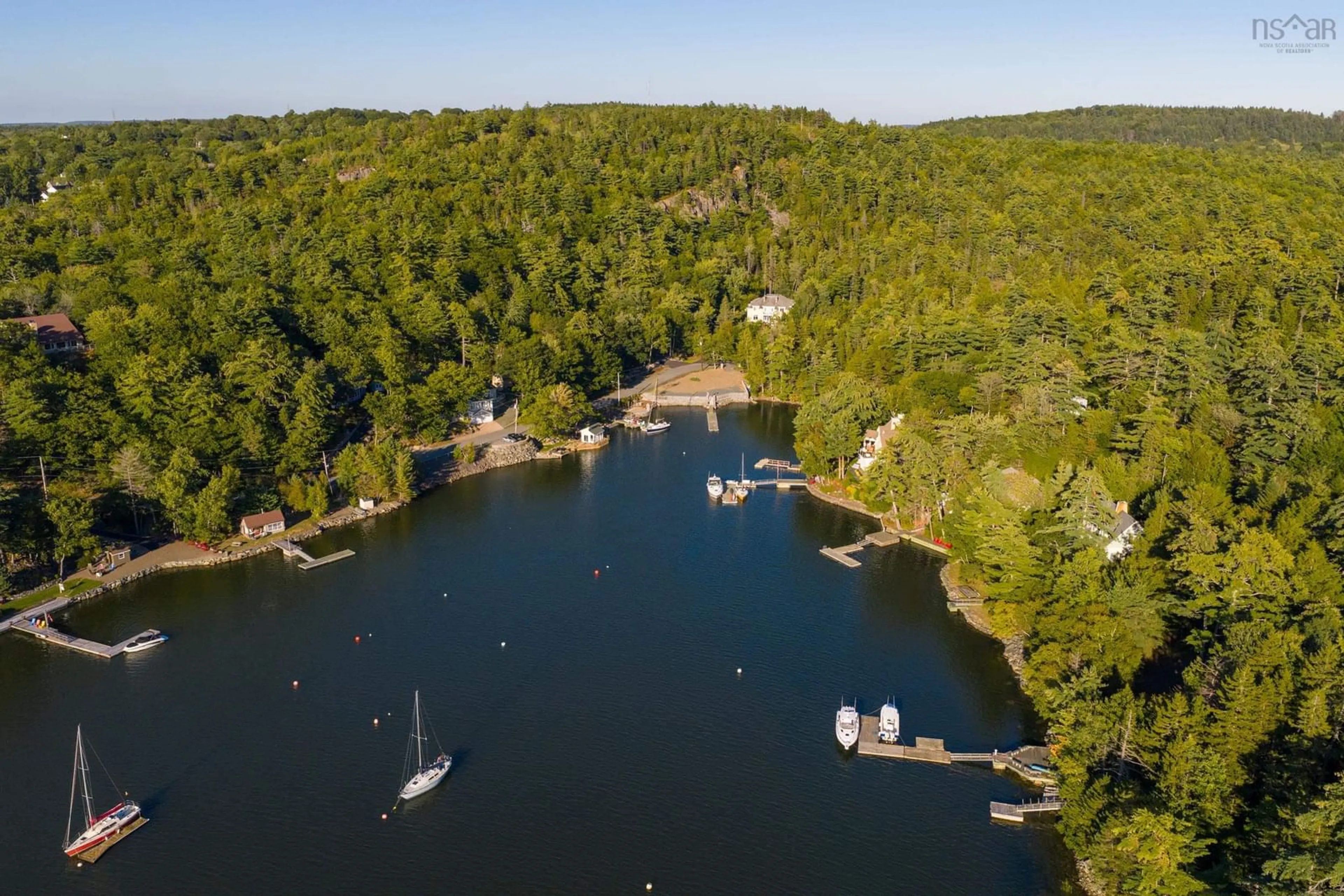 A pic from outside/outdoor area/front of a property/back of a property/a pic from drone, water/lake/river/ocean view for 1160 Shore Dr, Bedford Nova Scotia B4A 2E5