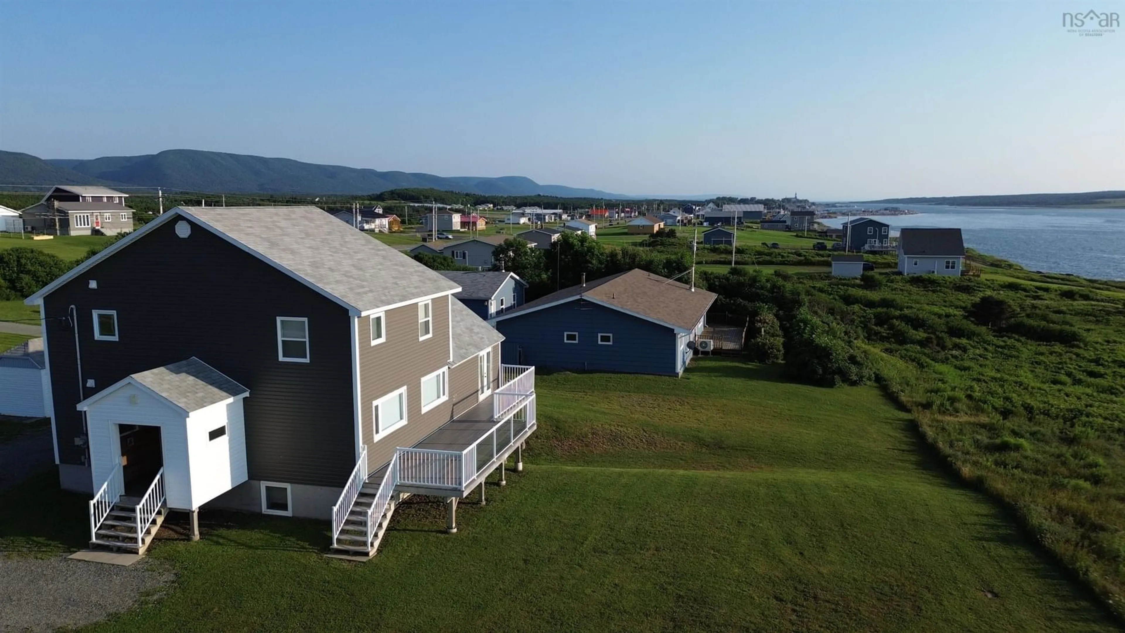 A pic from outside/outdoor area/front of a property/back of a property/a pic from drone, water/lake/river/ocean view for 15715 Cabot Trail, Chéticamp Nova Scotia B0E 1H0
