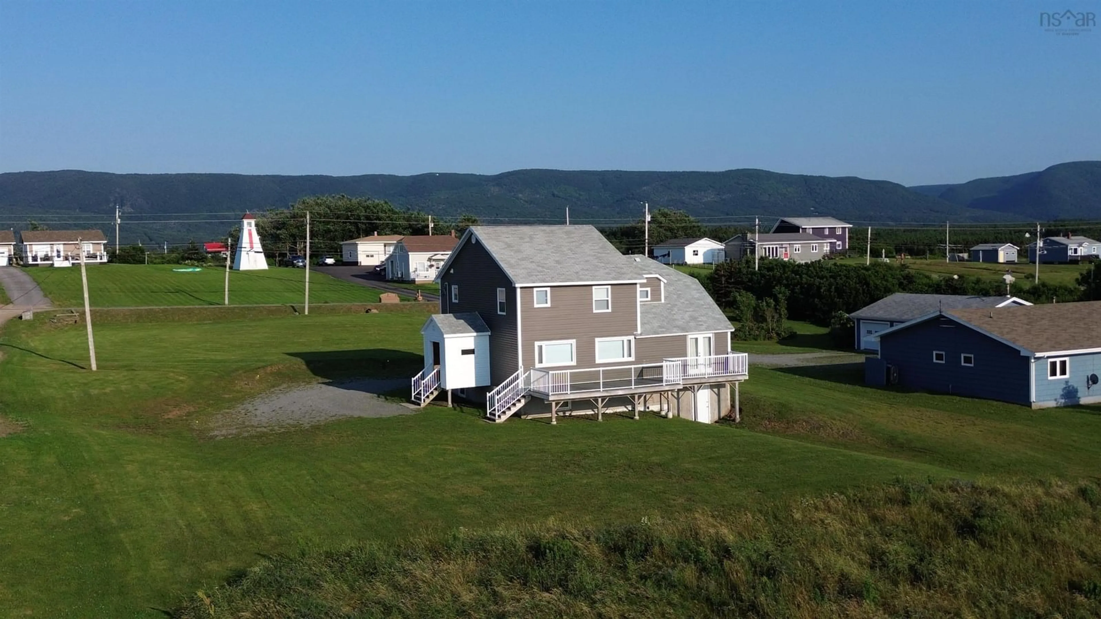A pic from outside/outdoor area/front of a property/back of a property/a pic from drone, water/lake/river/ocean view for 15715 Cabot Trail, Chéticamp Nova Scotia B0E 1H0