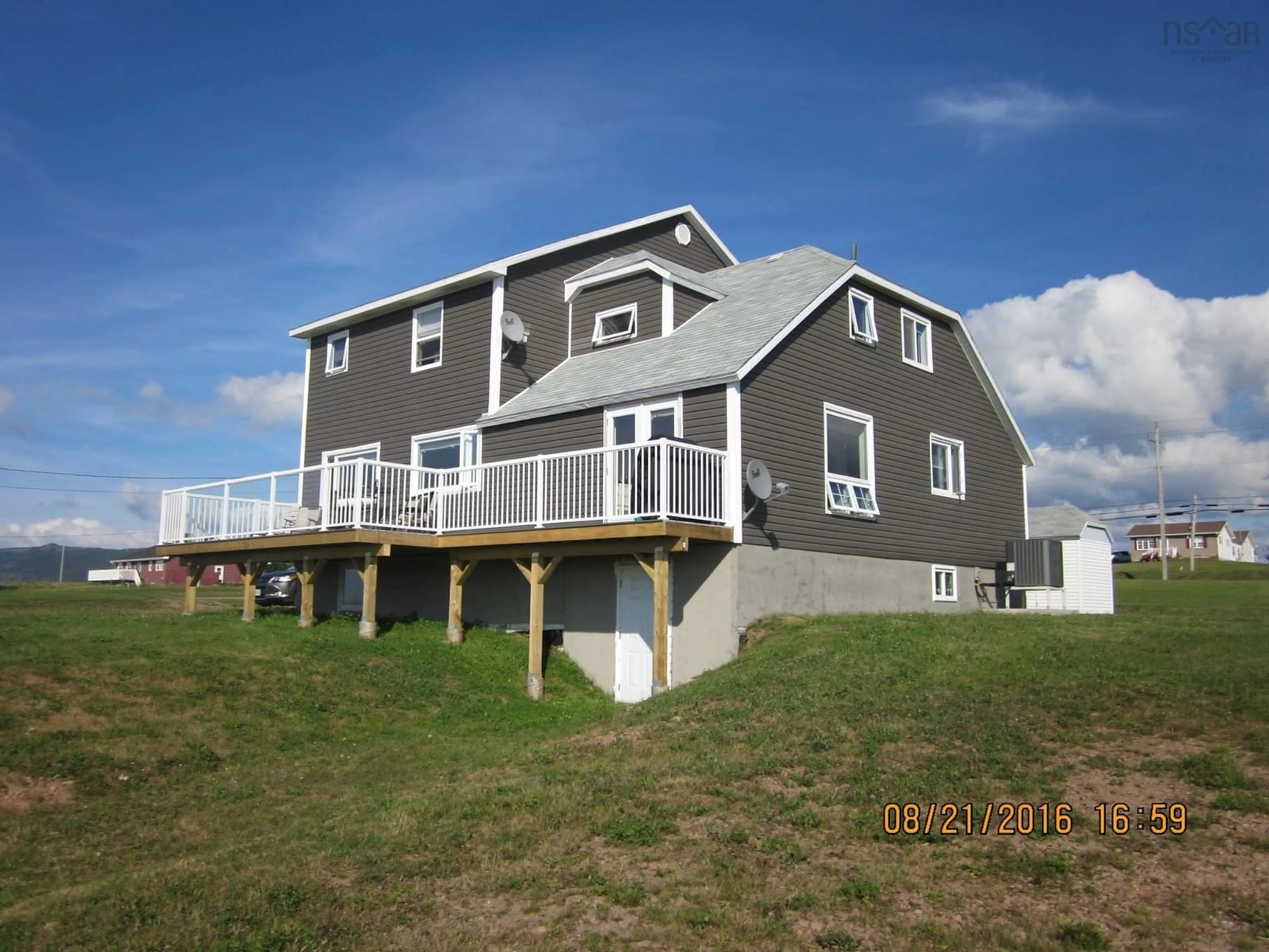 Home with vinyl exterior material, building for 15715 Cabot Trail, Chéticamp Nova Scotia B0E 1H0