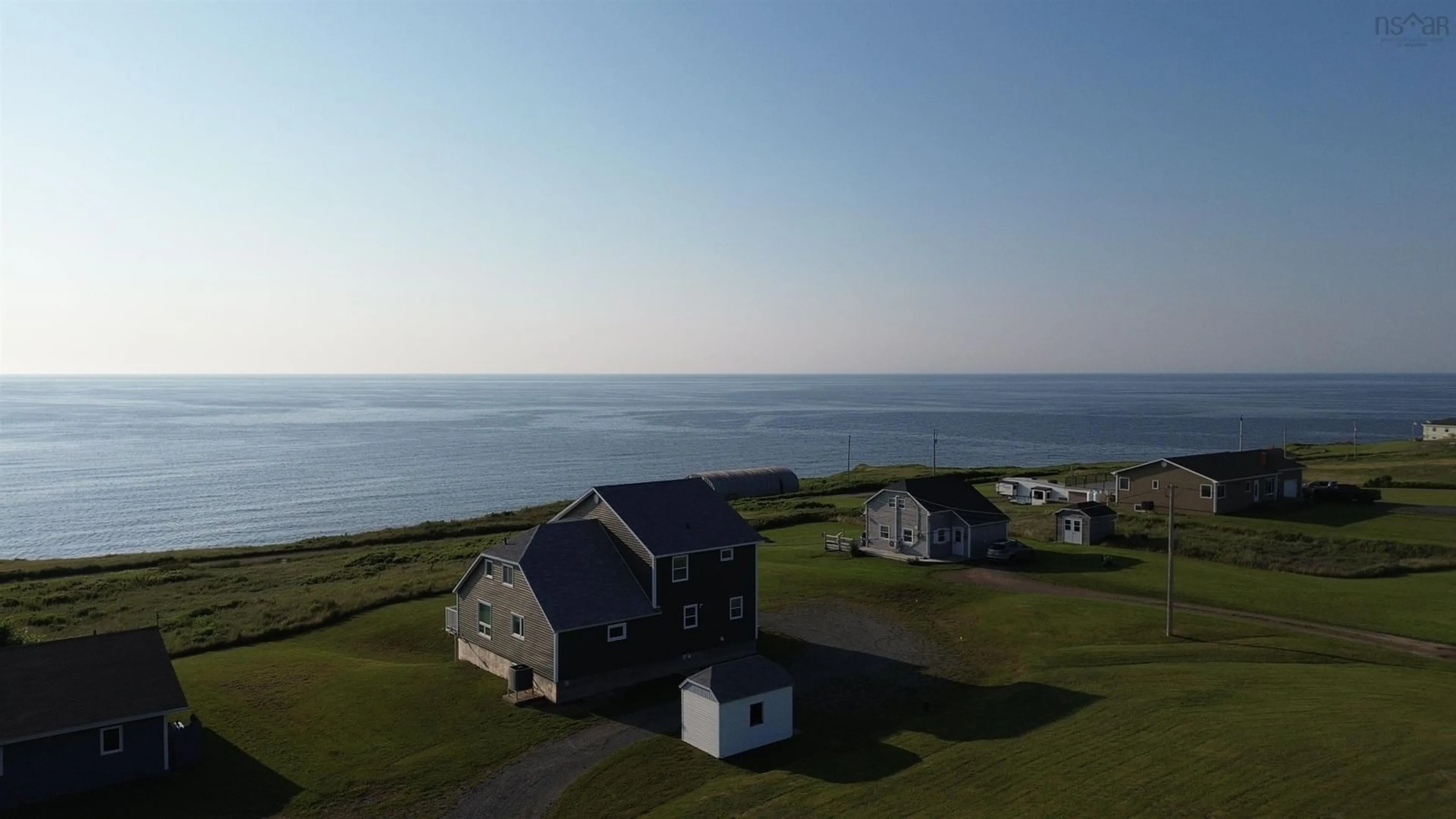 A pic from outside/outdoor area/front of a property/back of a property/a pic from drone, water/lake/river/ocean view for 15715 Cabot Trail, Chéticamp Nova Scotia B0E 1H0
