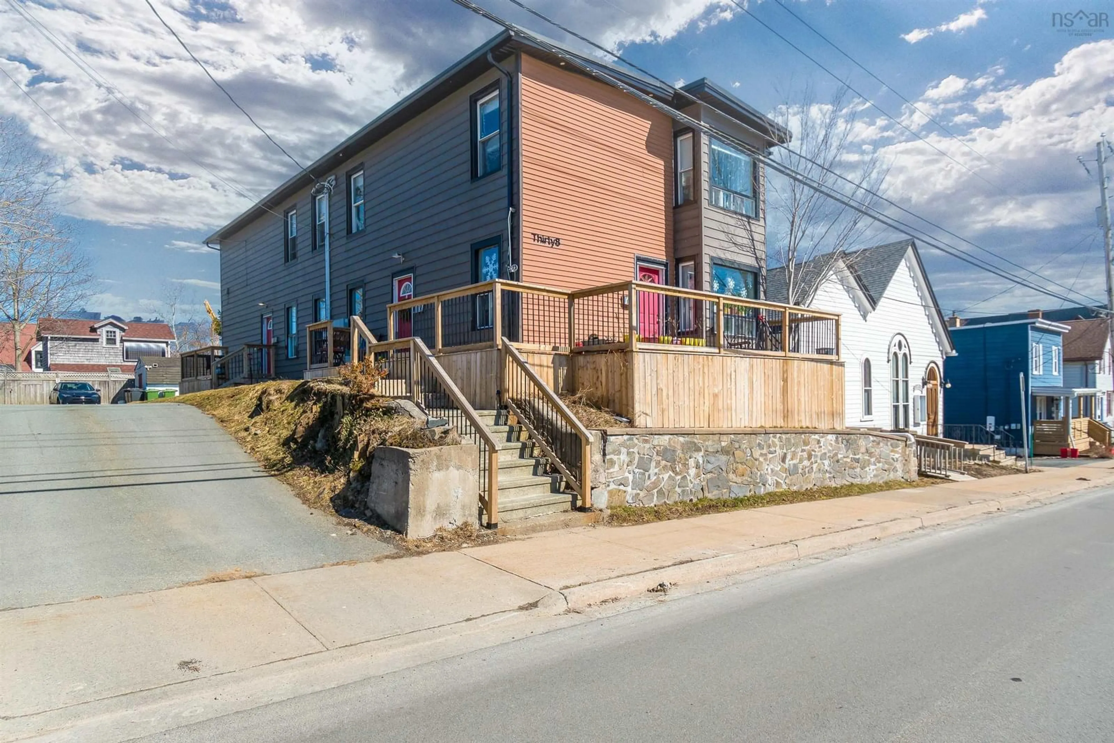 A pic from outside/outdoor area/front of a property/back of a property/a pic from drone, street for 38 Victoria Rd, Dartmouth Nova Scotia B2Y 2V9