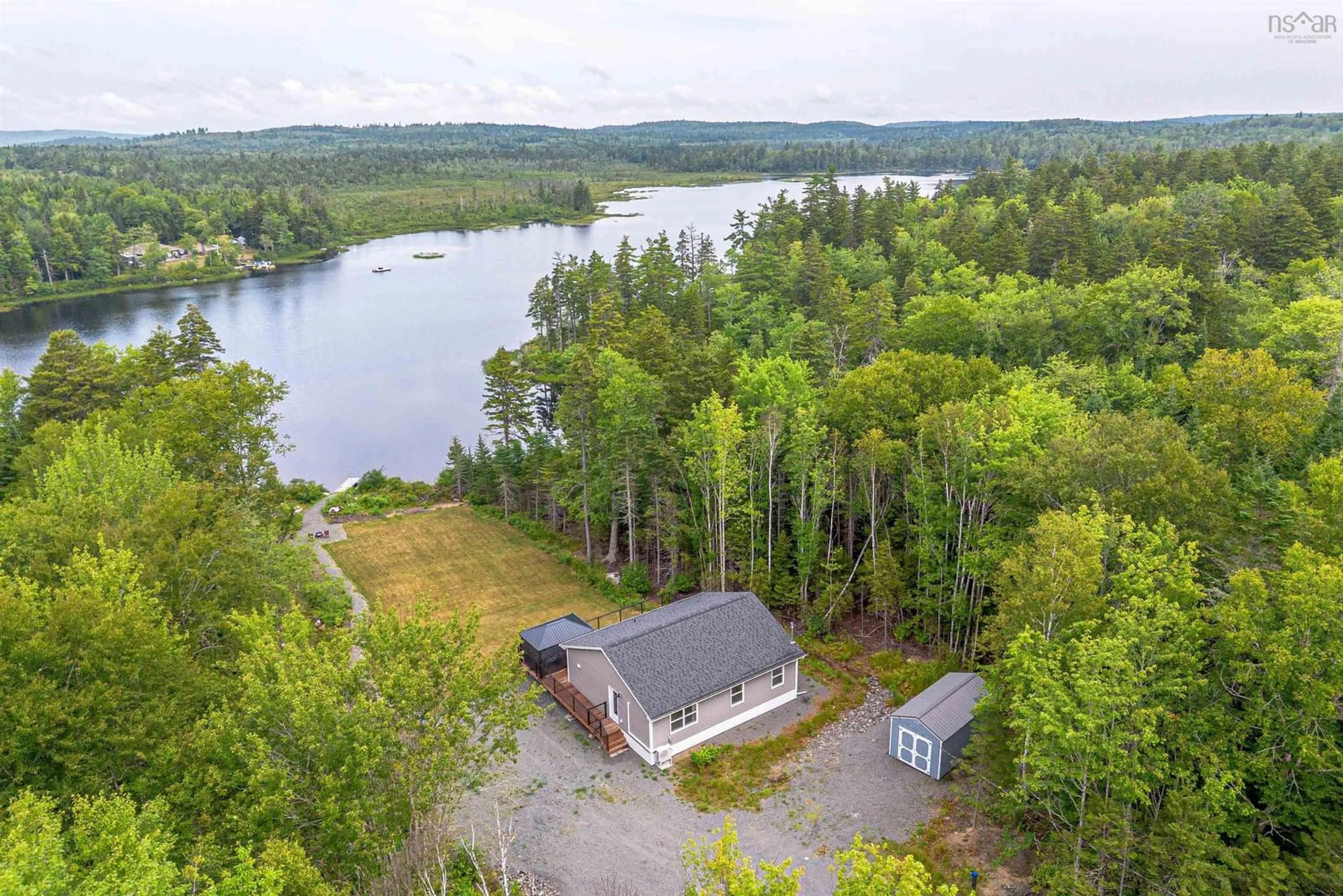 A pic from outside/outdoor area/front of a property/back of a property/a pic from drone, water/lake/river/ocean view for 195 Middle Lake South Rd, Vaughan Nova Scotia B0N 2T0