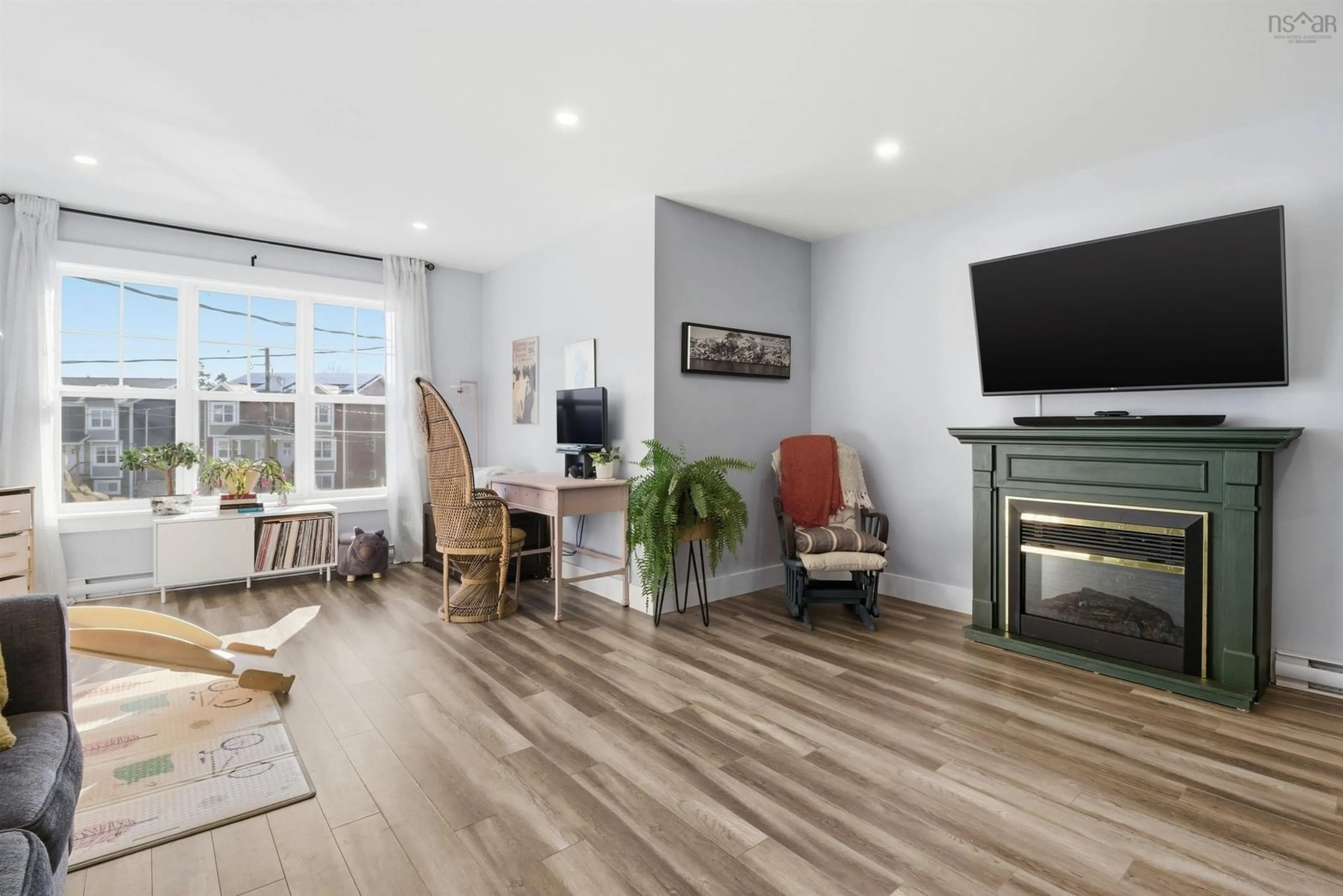 Living room with furniture, wood/laminate floor for 27 Trout Run, Halifax Nova Scotia B3P 1X3