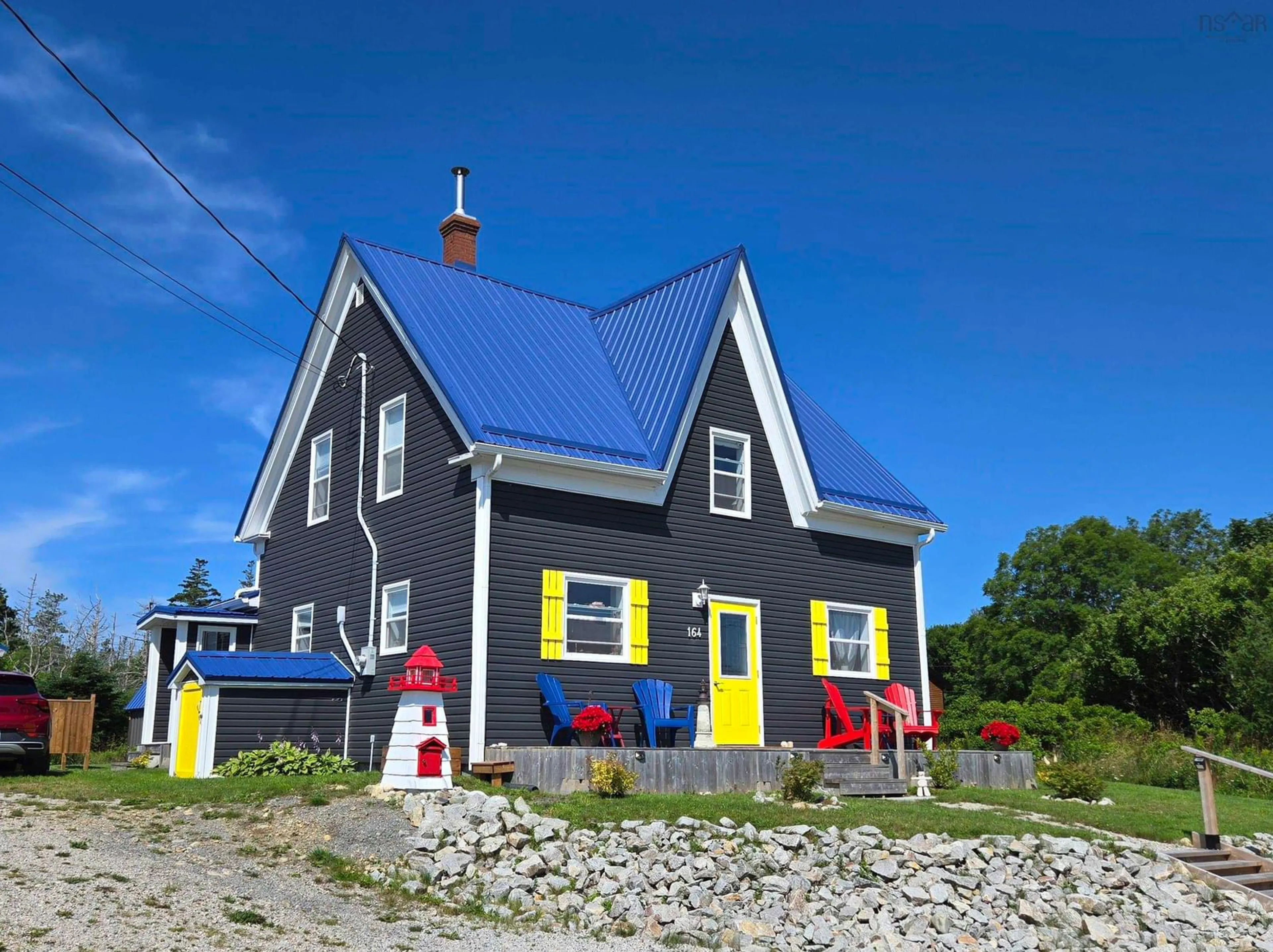 Home with vinyl exterior material, street for 164 Nicholas Rd, Lower Wedgeport Nova Scotia B0W 2B0