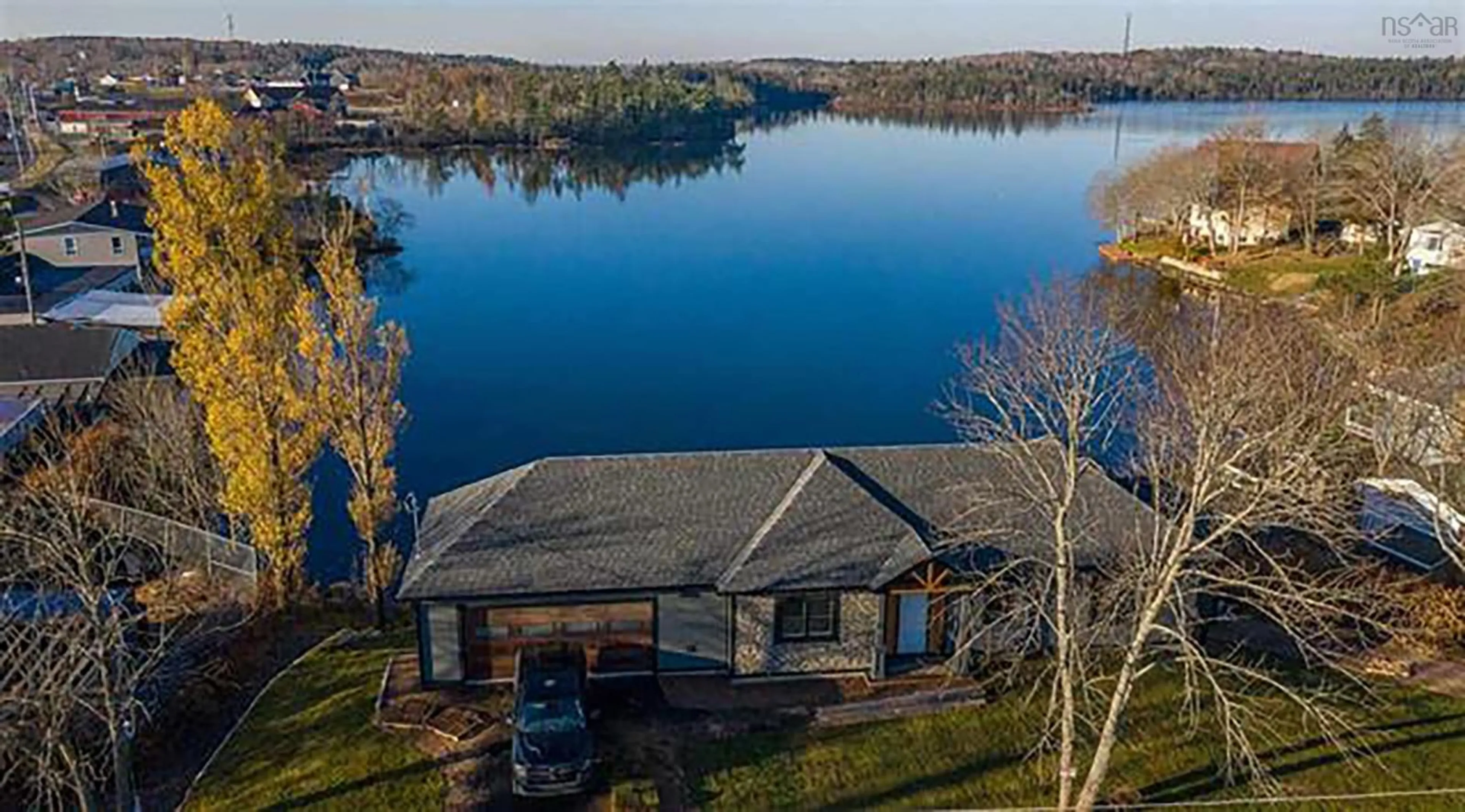 A pic from outside/outdoor area/front of a property/back of a property/a pic from drone, water/lake/river/ocean view for 30 Montague Rd, Lake Loon Nova Scotia B2W 4M4