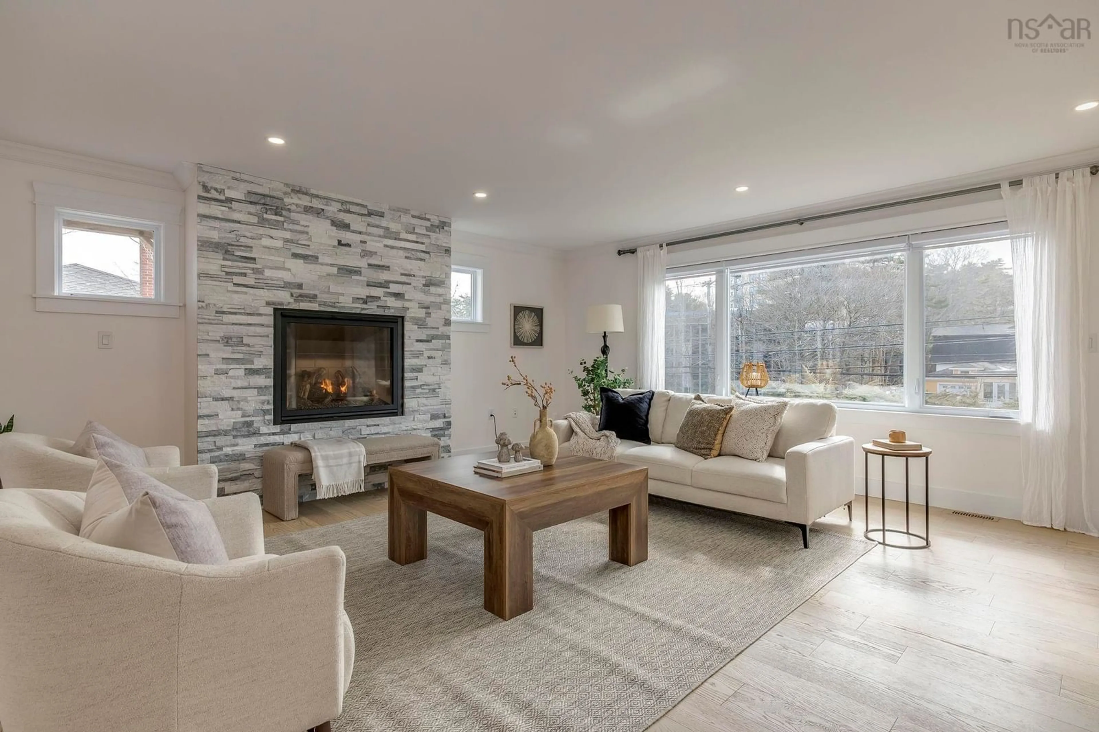 Living room with furniture, ceramic/tile floor for 2779 Joseph Howe Dr, Halifax Nova Scotia B3L 4G8