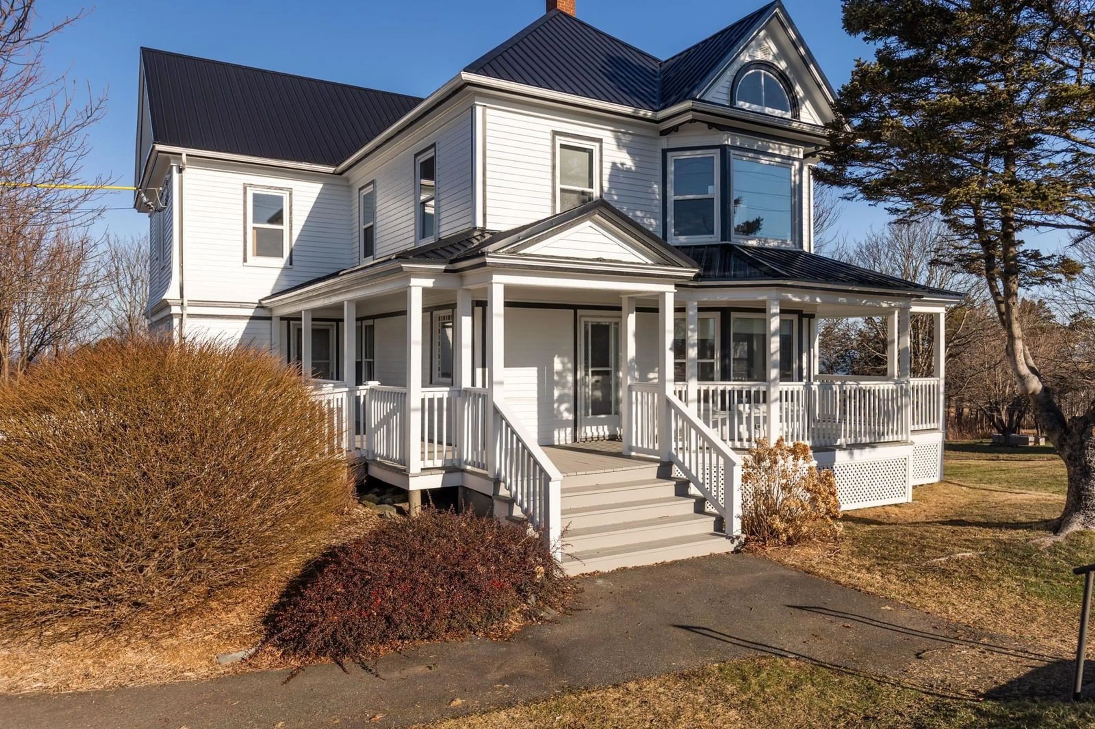 Home with vinyl exterior material, street for 1833 Highway 1, Church Point Nova Scotia B0W 1M0