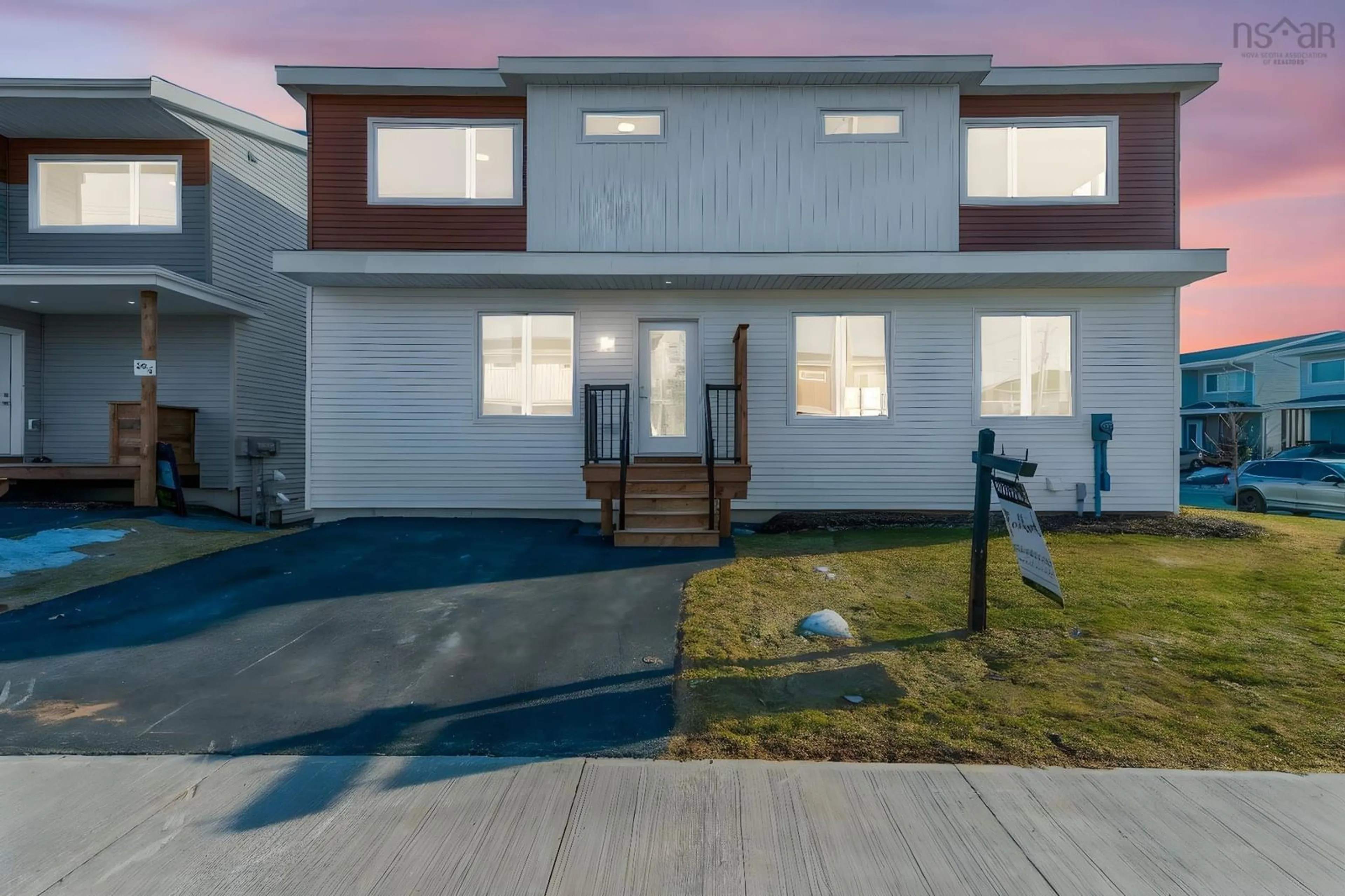Home with vinyl exterior material, street for 48 Berm St, Herring Cove Nova Scotia B3R 0H2