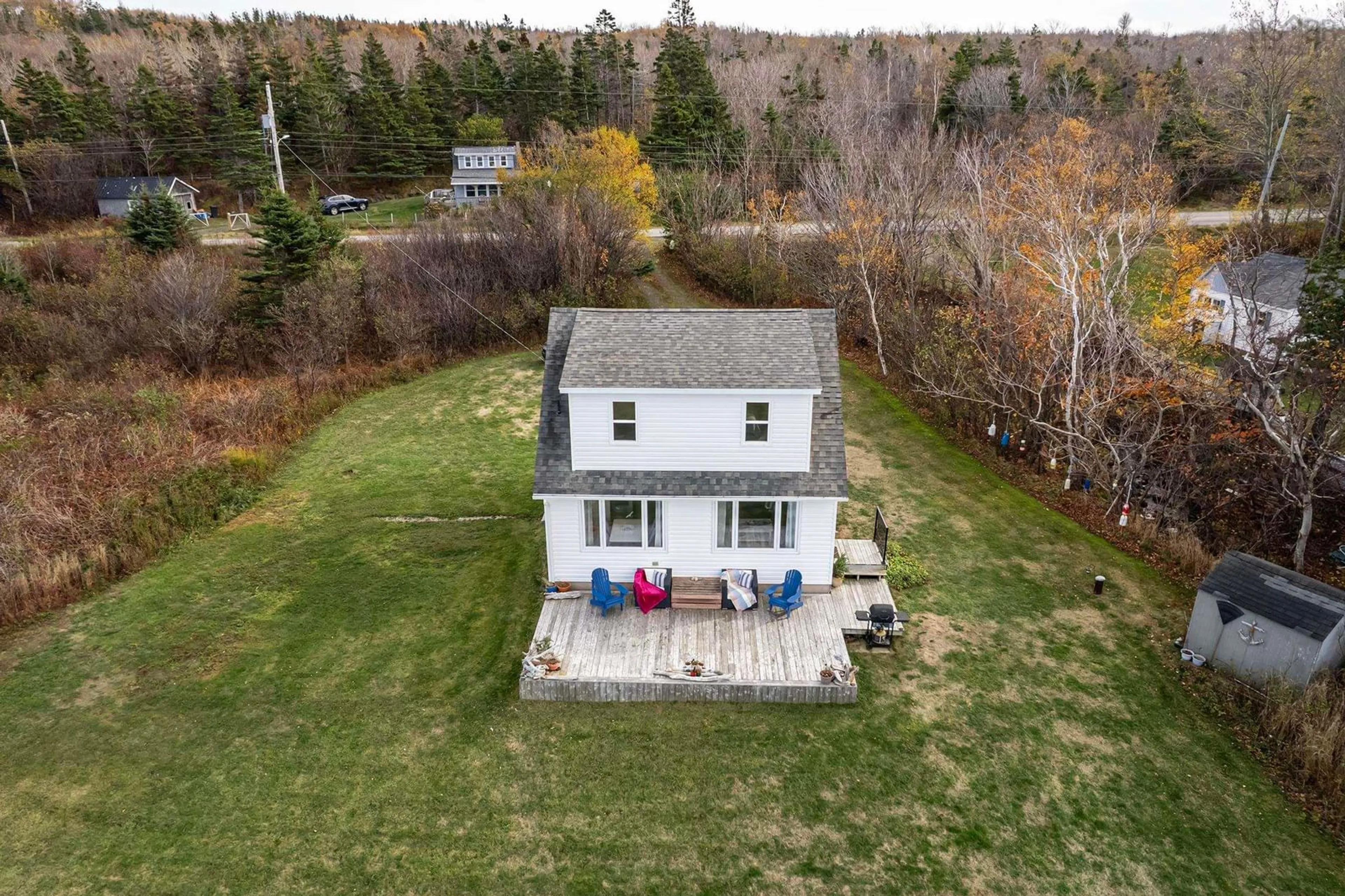 A pic from outside/outdoor area/front of a property/back of a property/a pic from drone, unknown for 5015 Shore Rd, Parkers Cove Nova Scotia B0S 1A0