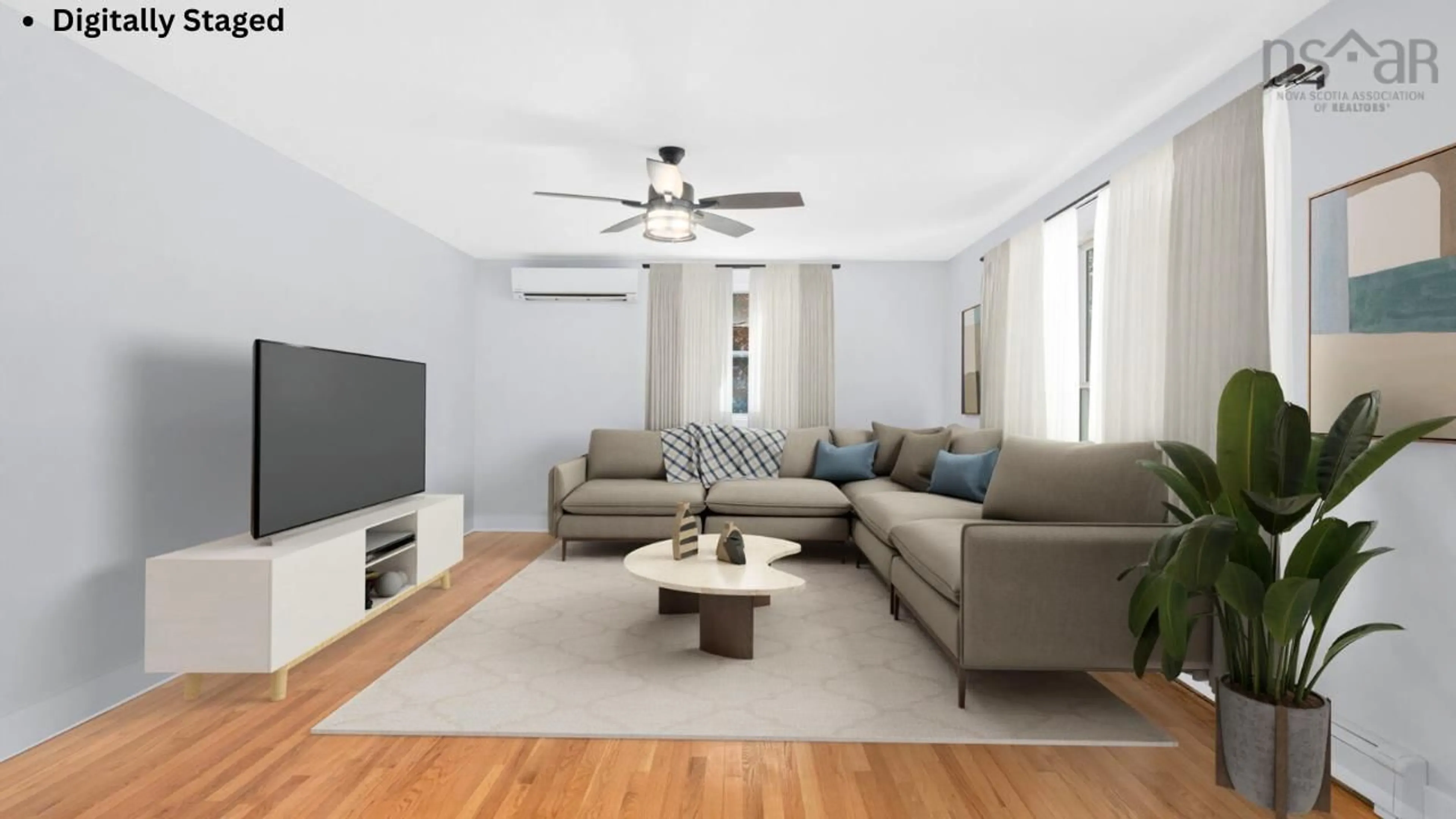 Living room with furniture, wood/laminate floor for 914 Maple Ave, Aylesford Nova Scotia B0P 1C0