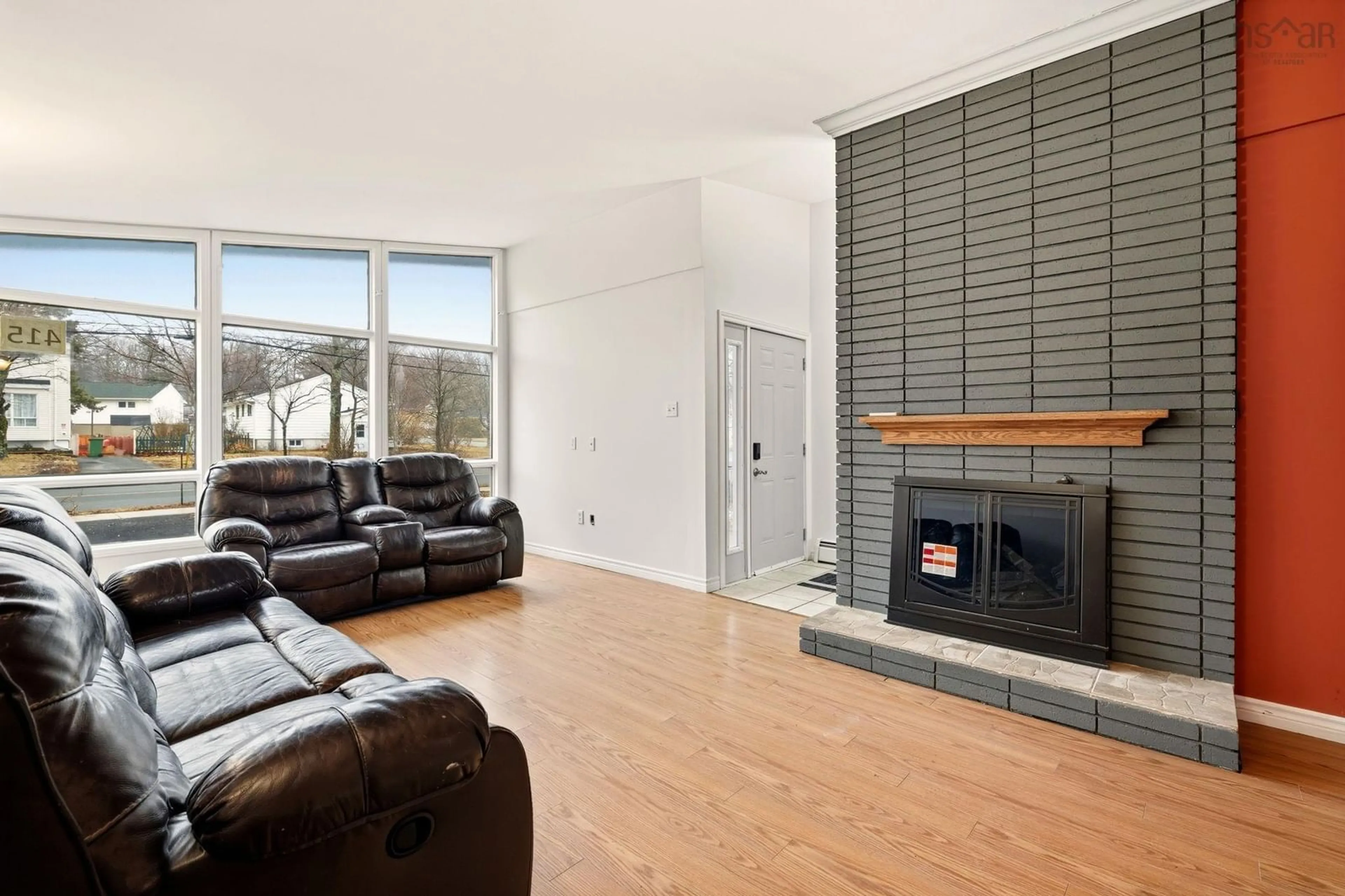 Living room with furniture, wood/laminate floor for 415 Spring Ave, Dartmouth Nova Scotia B2W 1X9
