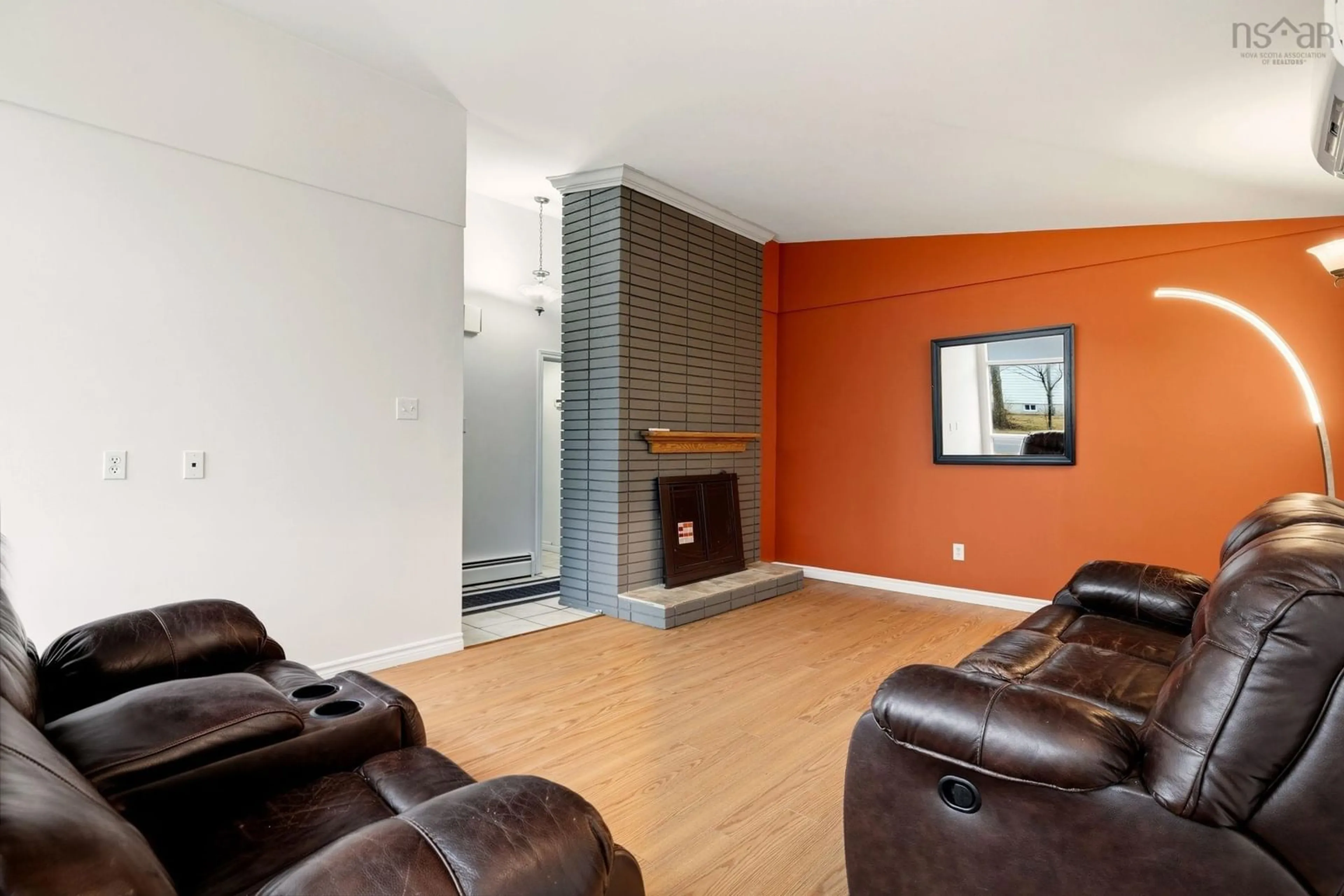 Living room with furniture, wood/laminate floor for 415 Spring Ave, Dartmouth Nova Scotia B2W 1X9