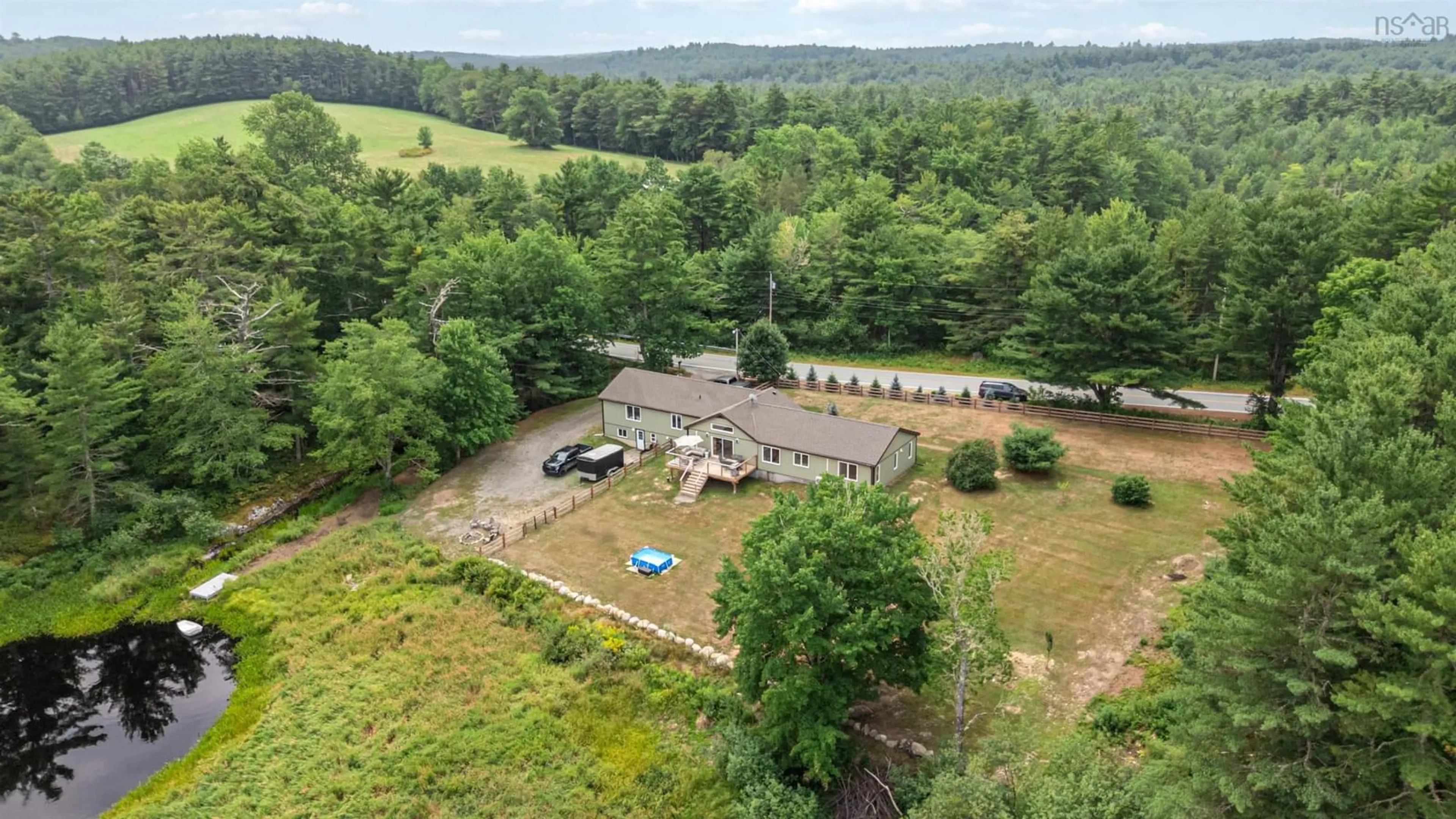 A pic from outside/outdoor area/front of a property/back of a property/a pic from drone, water/lake/river/ocean view for 8710 Highway 8, South Brookfield Nova Scotia B0T 1X0