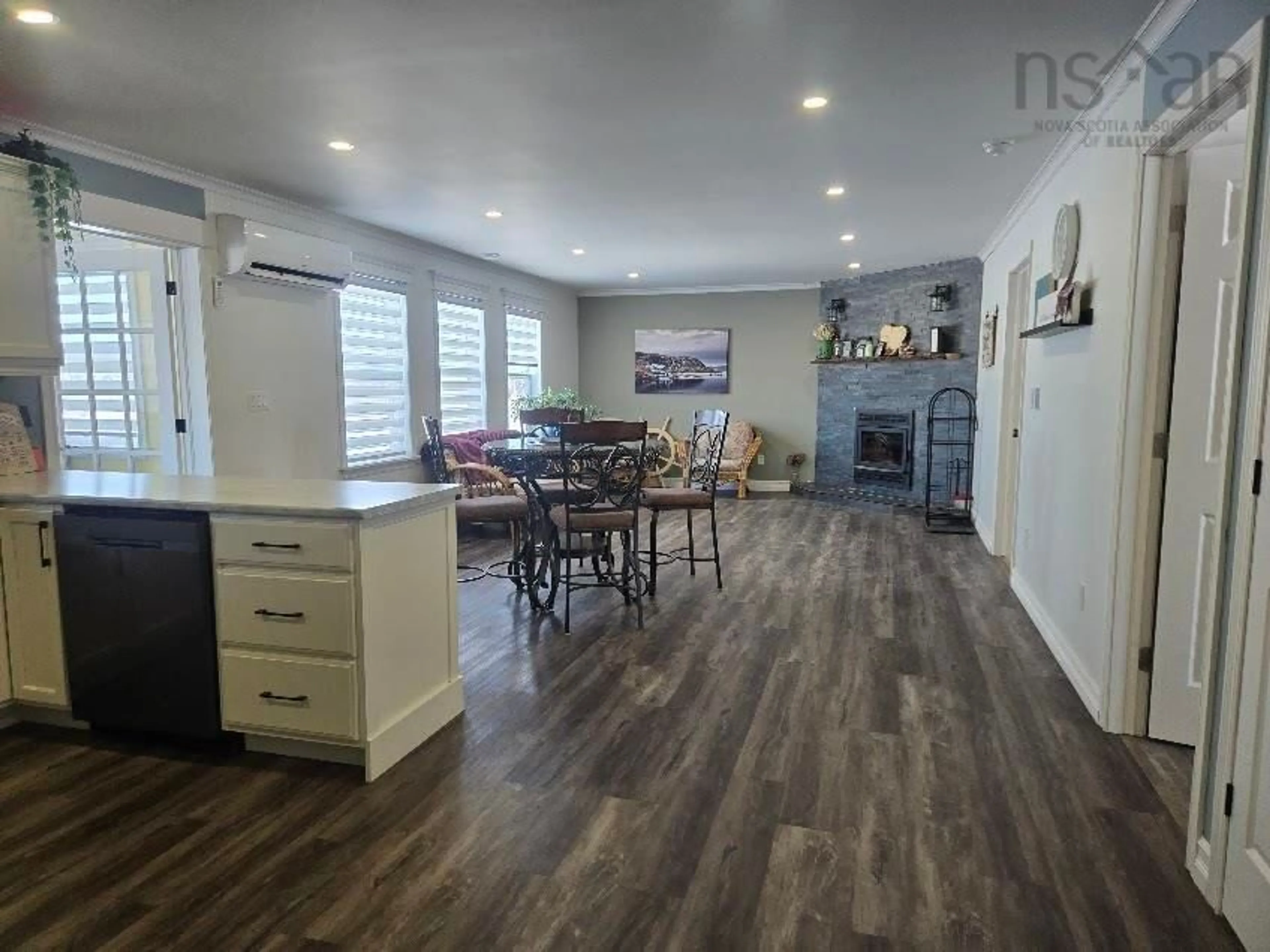 Open concept kitchen, wood/laminate floor for 26 Macmaster Lane, Seafoam Nova Scotia B0K 1N0
