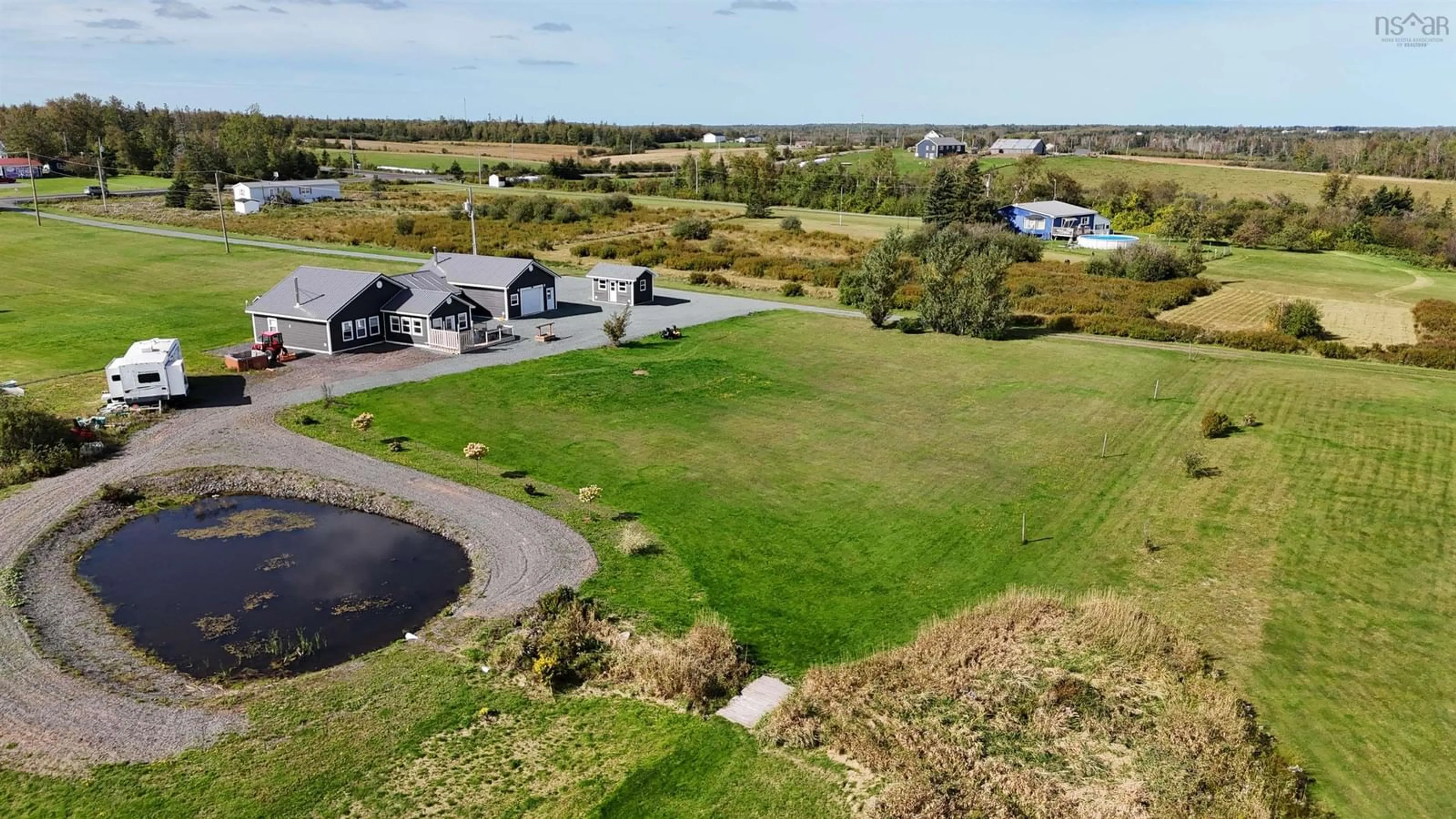 A pic from outside/outdoor area/front of a property/back of a property/a pic from drone, water/lake/river/ocean view for 26 Macmaster Lane, Seafoam Nova Scotia B0K 1N0
