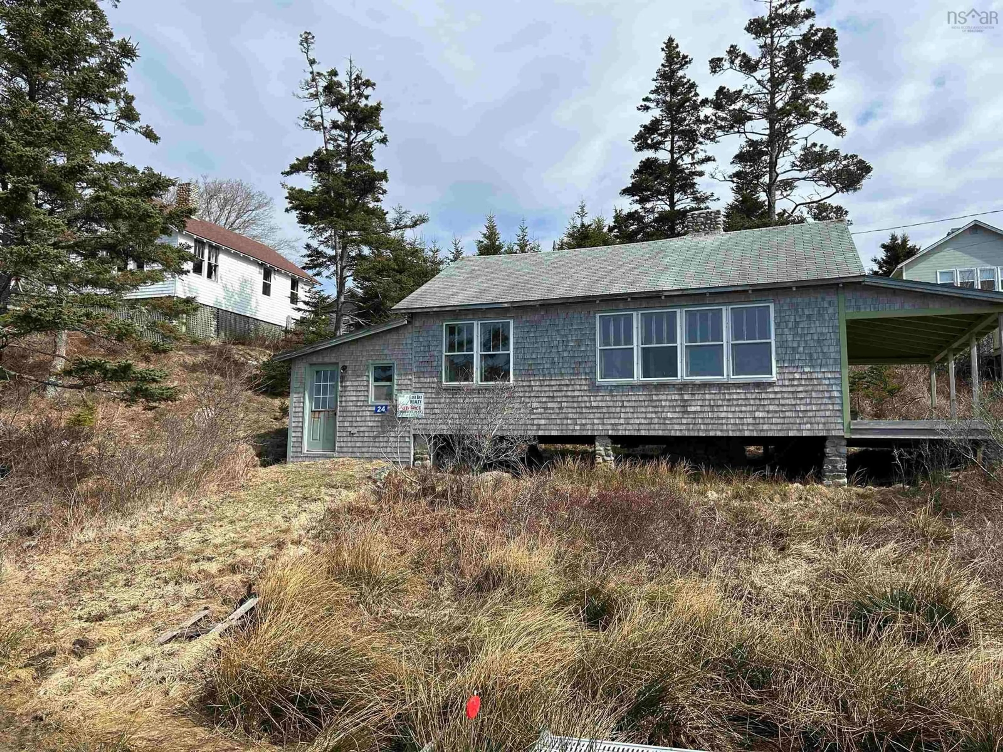 A pic from outside/outdoor area/front of a property/back of a property/a pic from drone, unknown for 24 Bayview Avenue, Villagedale Nova Scotia B0W 1E0