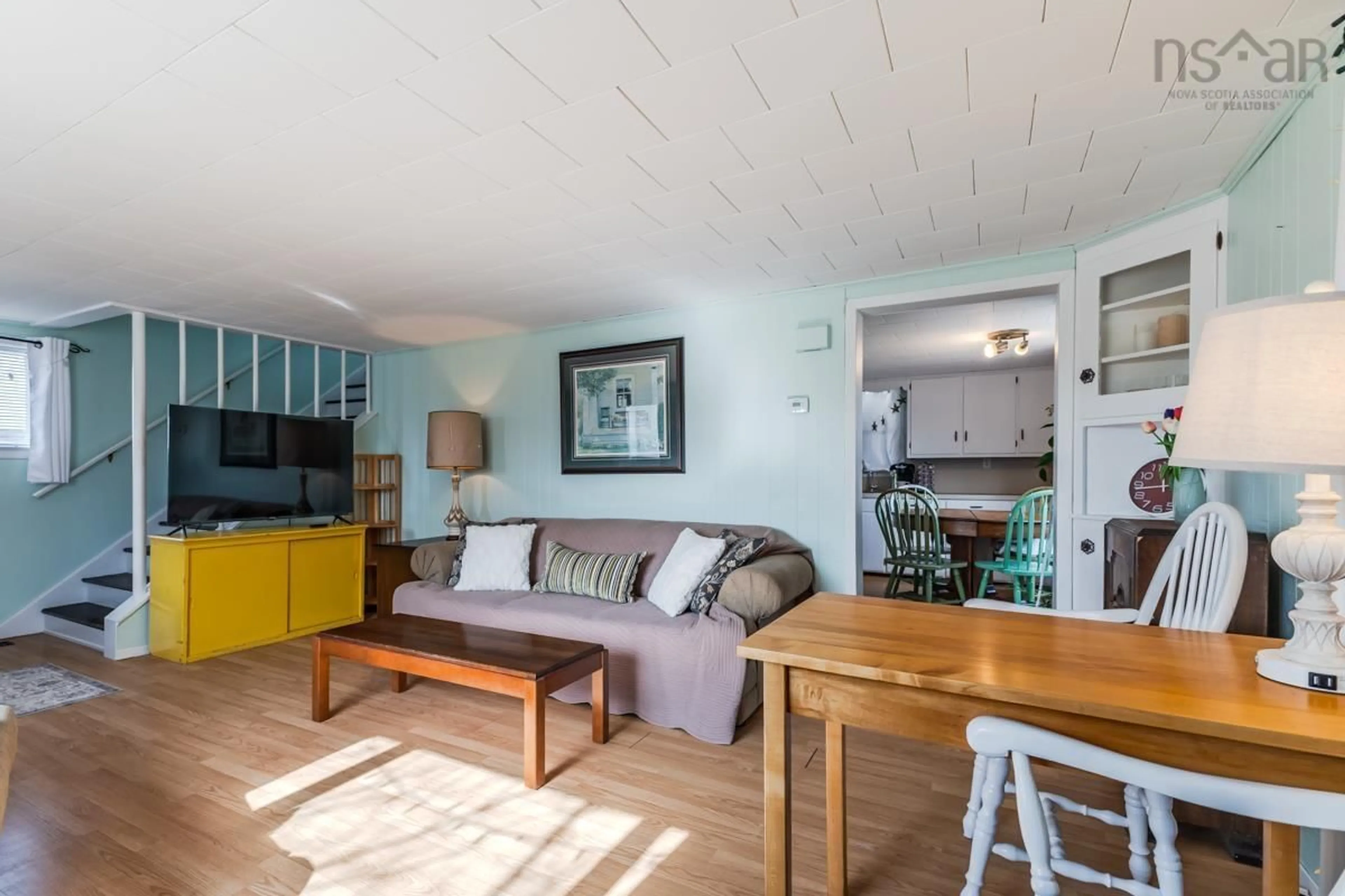 Living room with furniture, wood/laminate floor for 17 Lake Rd, Tatamagouche Nova Scotia B0K 1V0