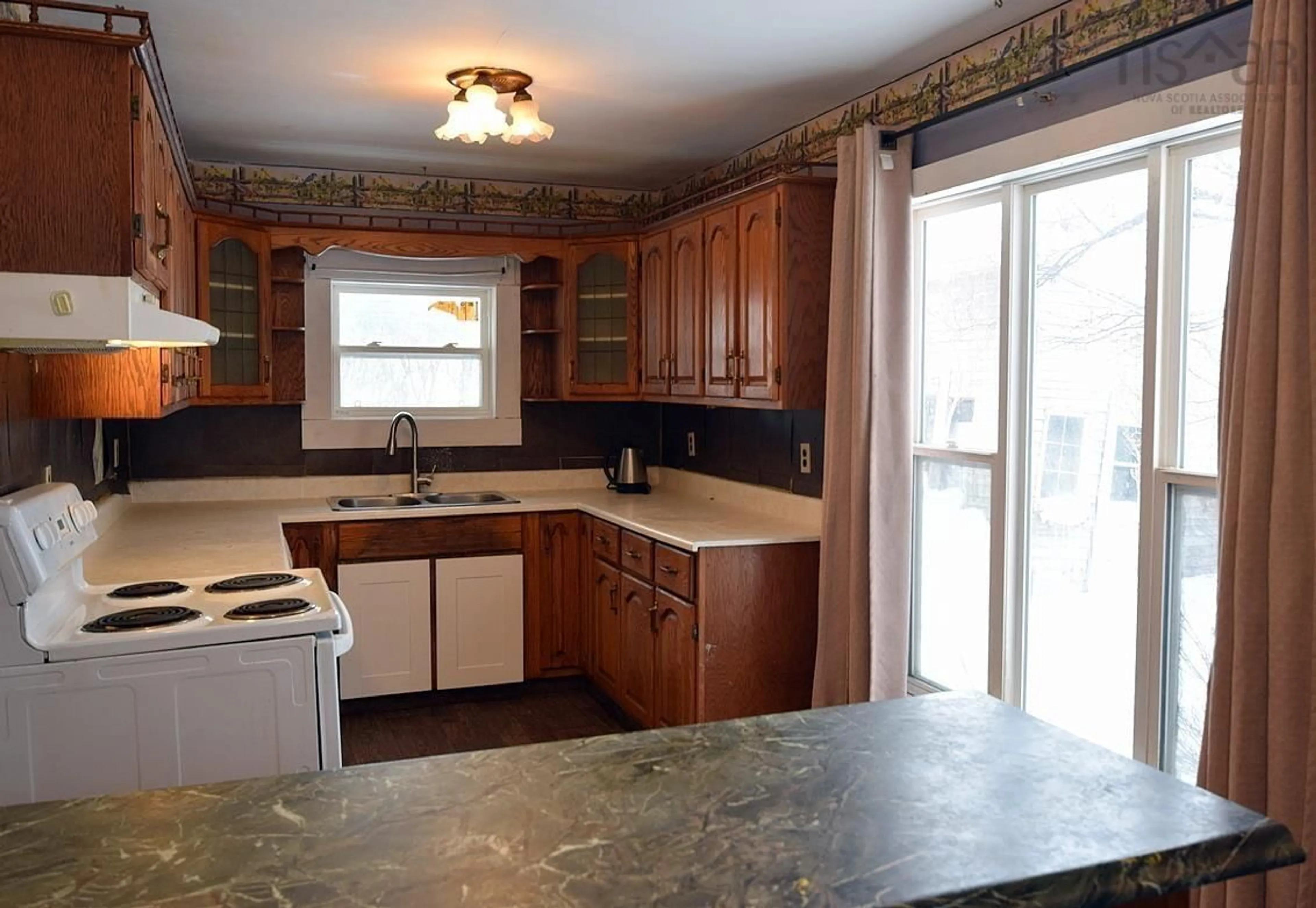 Standard kitchen, ceramic/tile floor for 8 Allan J Memorial Ave, Inverness Nova Scotia B0E 1N0