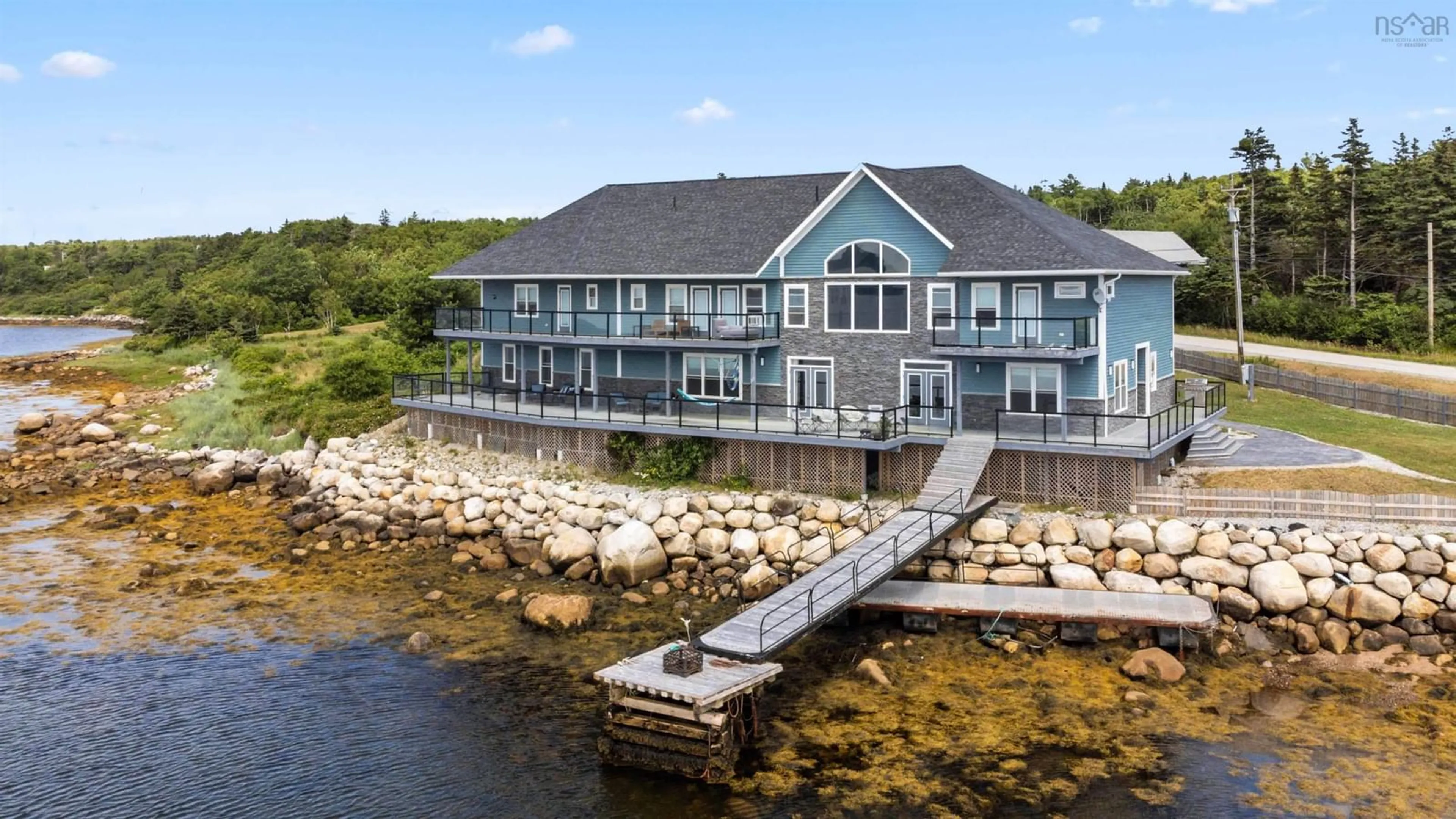 A pic from outside/outdoor area/front of a property/back of a property/a pic from drone, water/lake/river/ocean view for 1112 Sandy Point Rd, Sandy Point Nova Scotia B0T 1W0