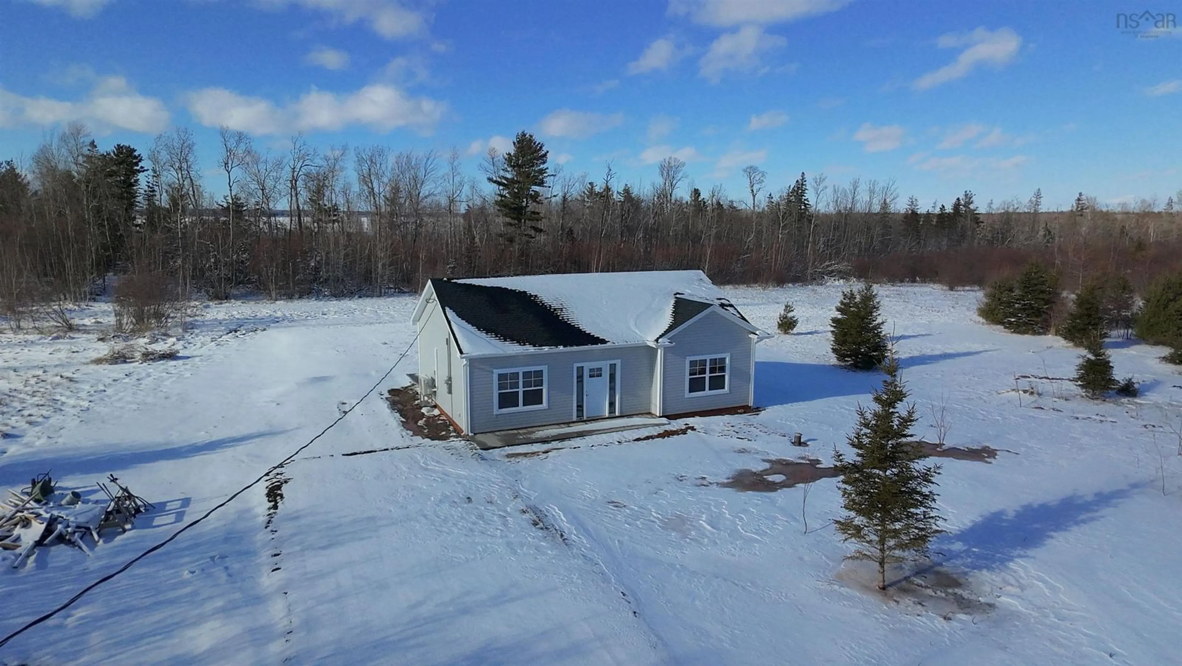 A pic from outside/outdoor area/front of a property/back of a property/a pic from drone, unknown for 55 Brule Shore Rd, Barrachois Nova Scotia B0K 1V0