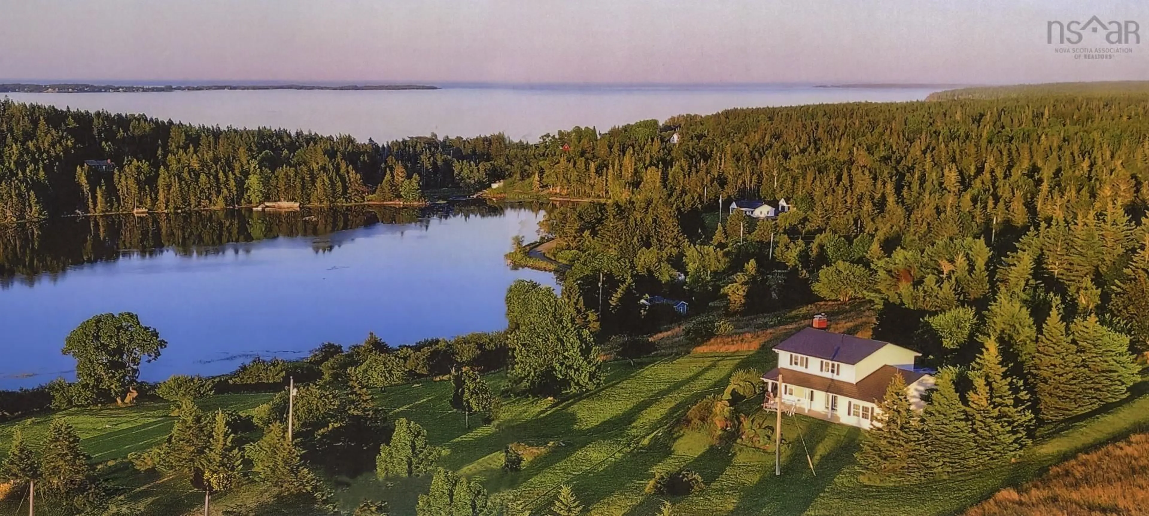 A pic from outside/outdoor area/front of a property/back of a property/a pic from drone, water/lake/river/ocean view for 210 South Cove Dr, Feltzen South Nova Scotia B0J 2X0