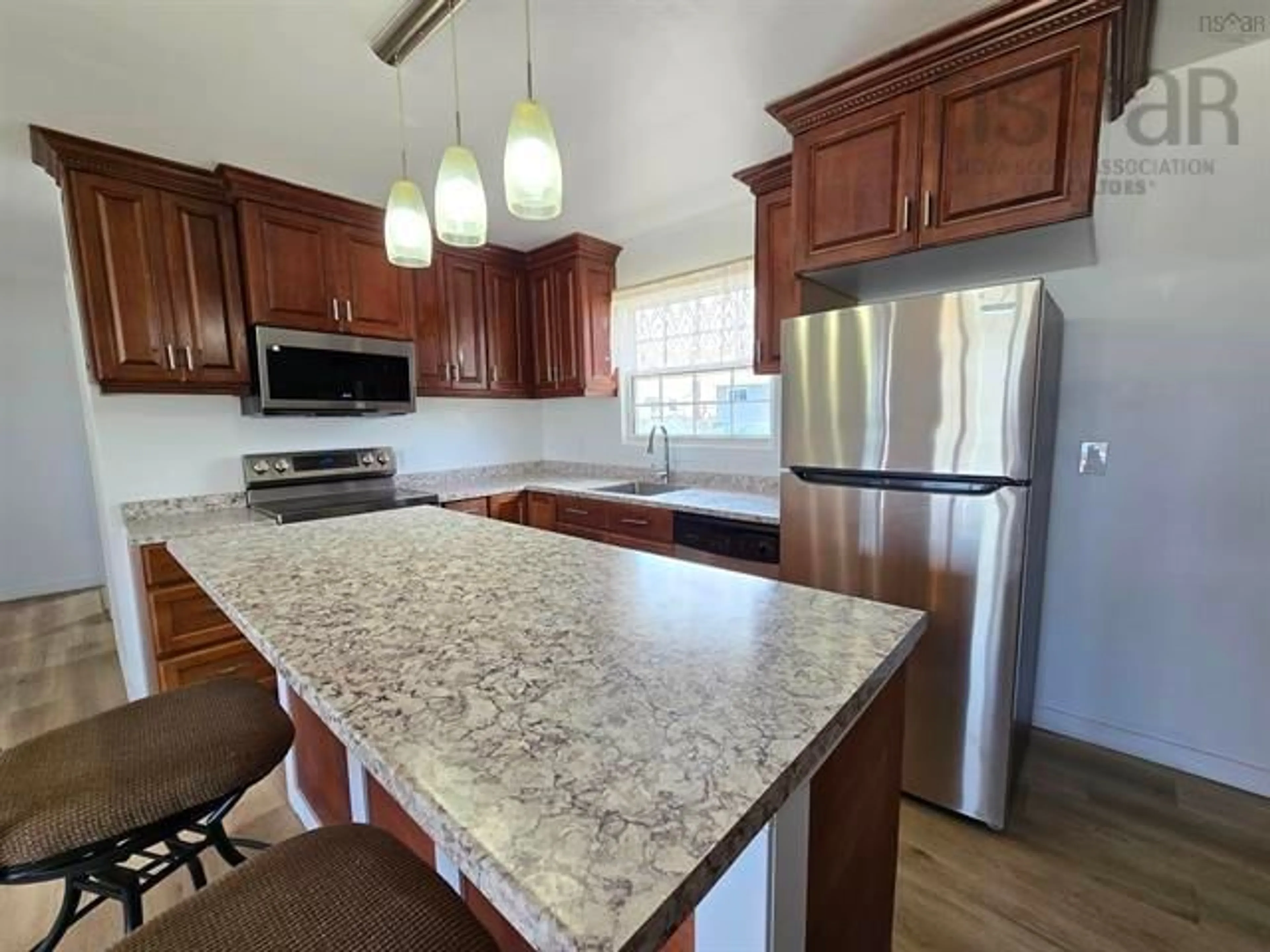 Open concept kitchen, ceramic/tile floor for 268 Gatacre St, Sydney Nova Scotia B1N 1Z5