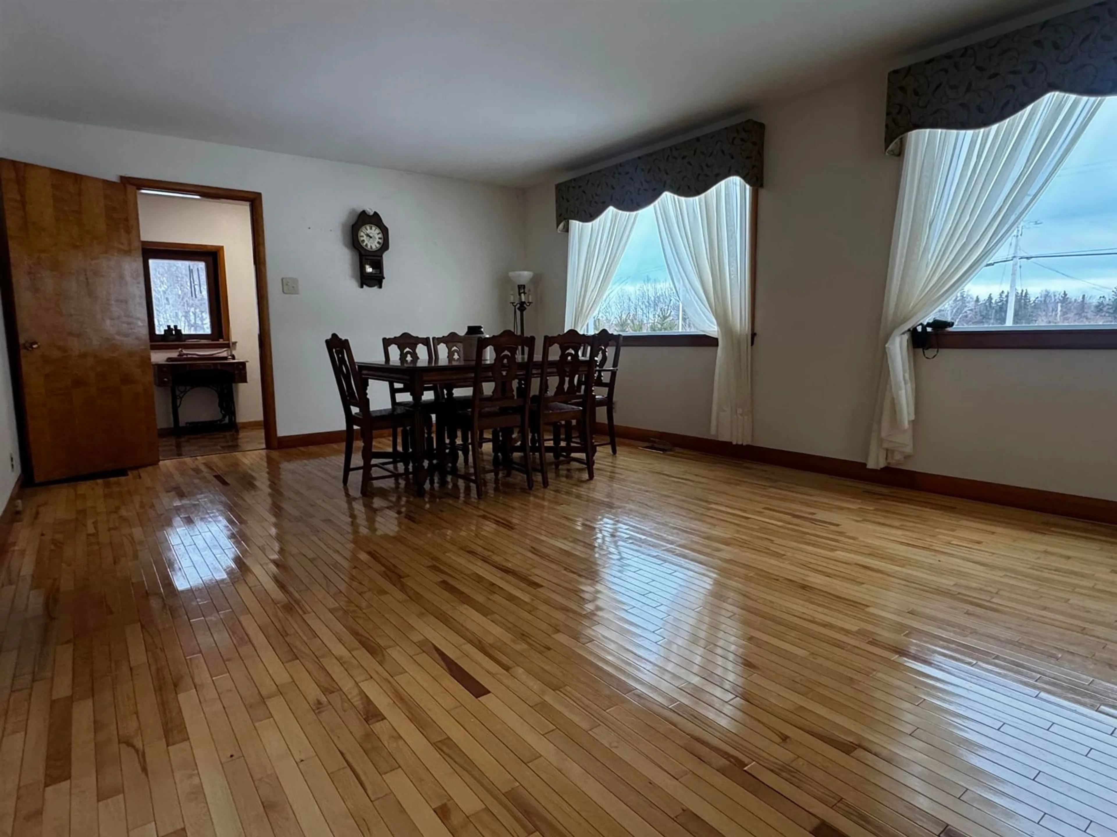 Dining room, wood/laminate floor for 7903 East Bay Hwy, Big Pond Centre Nova Scotia B1J 1Z3