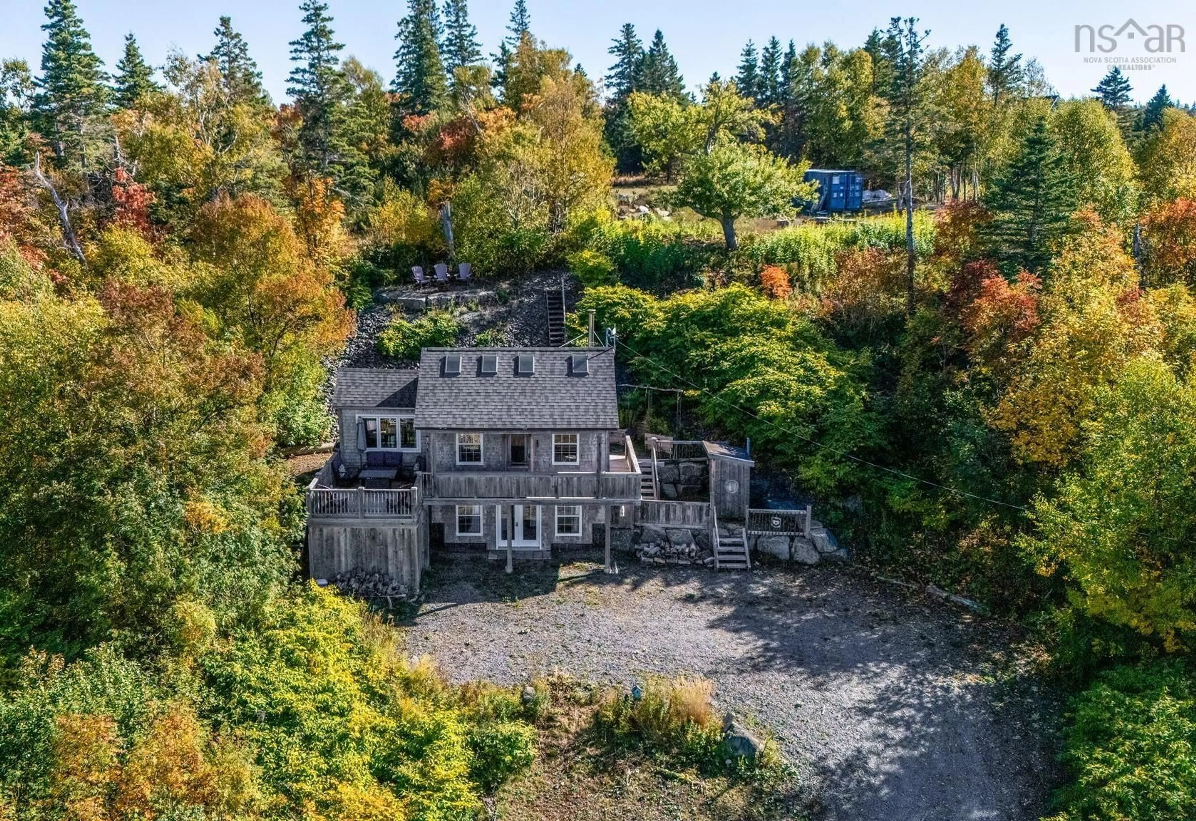 A pic from outside/outdoor area/front of a property/back of a property/a pic from drone, unknown for 54 Cove Rd, Halls Harbour Nova Scotia B0P 1J0