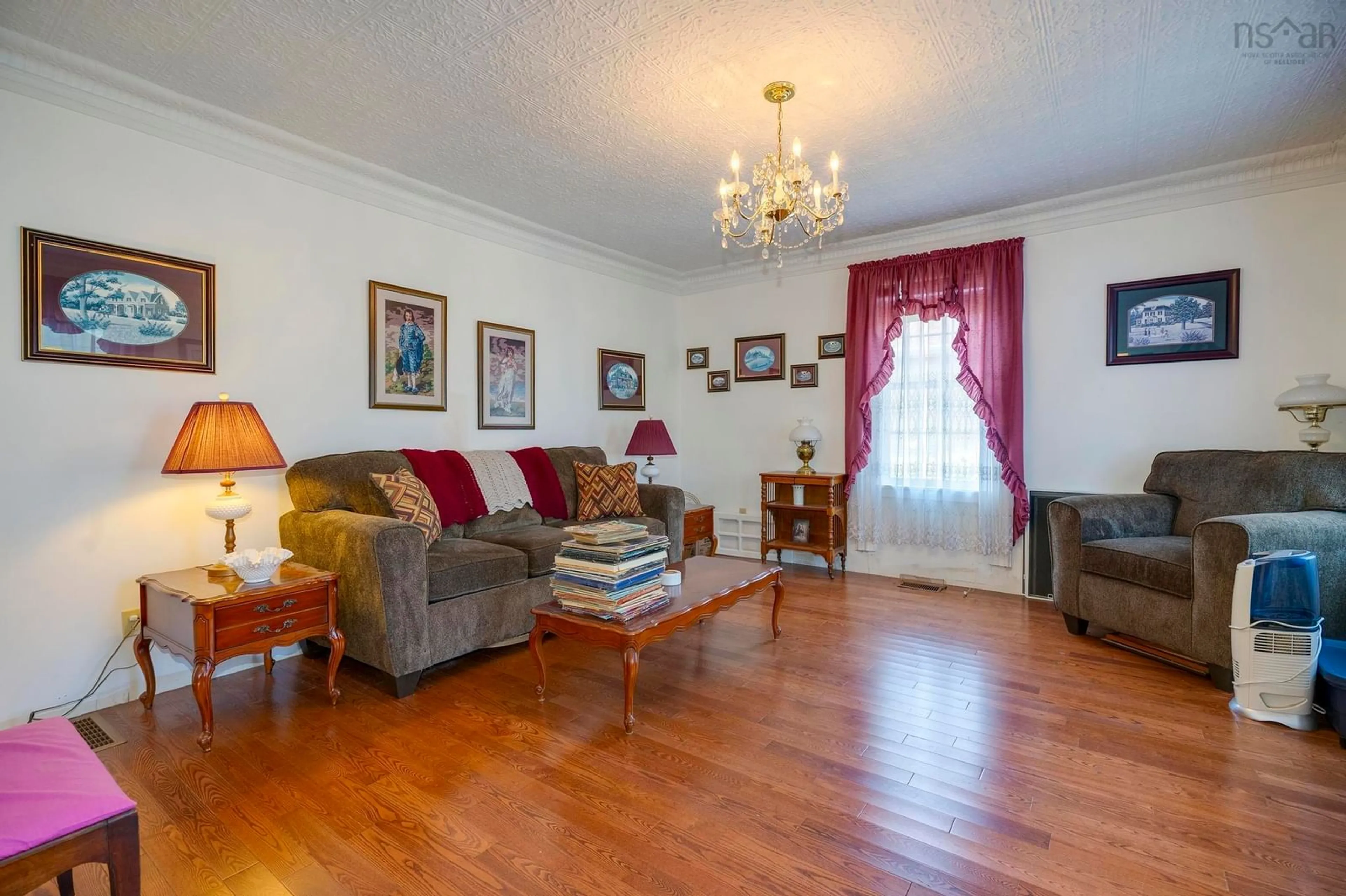 Living room with furniture, wood/laminate floor for 5454 Granville Rd, Granville Ferry Nova Scotia B0S 1A0