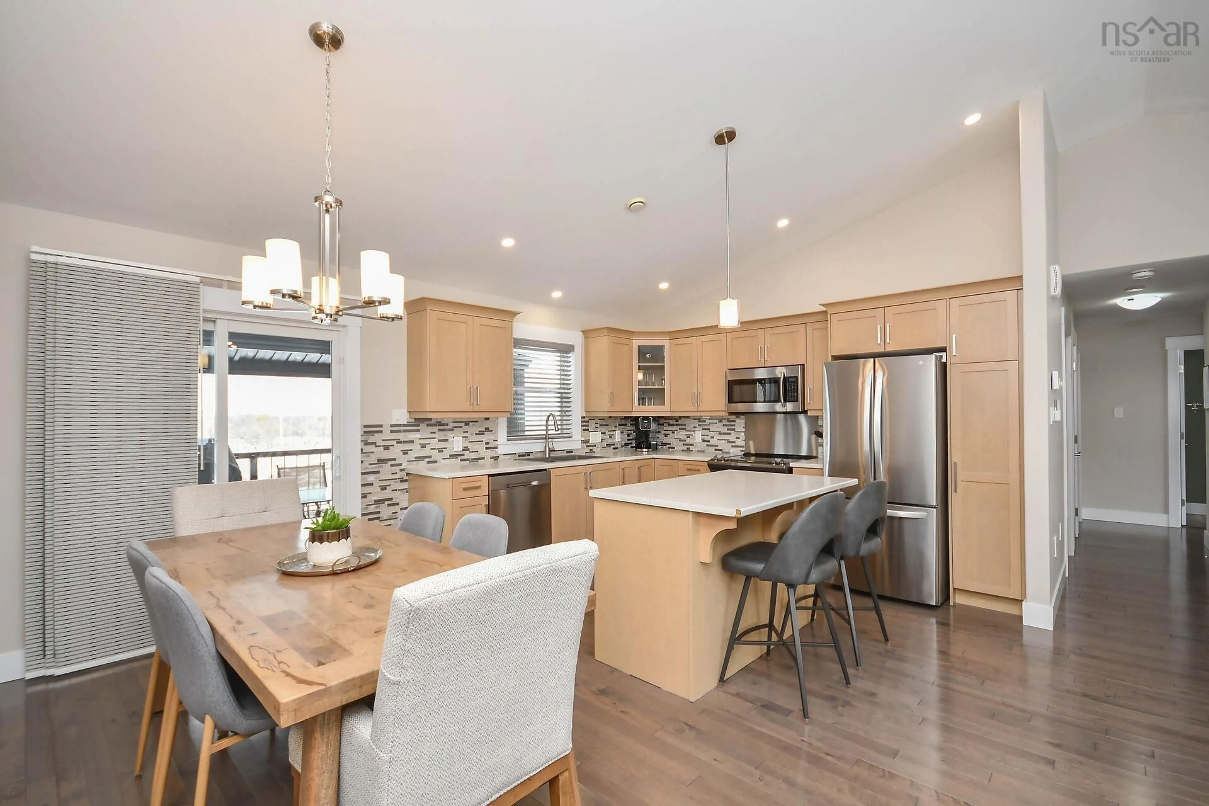 Open concept kitchen, wood/laminate floor for 44 Yew St, Hammonds Plains Nova Scotia B4B 0M8