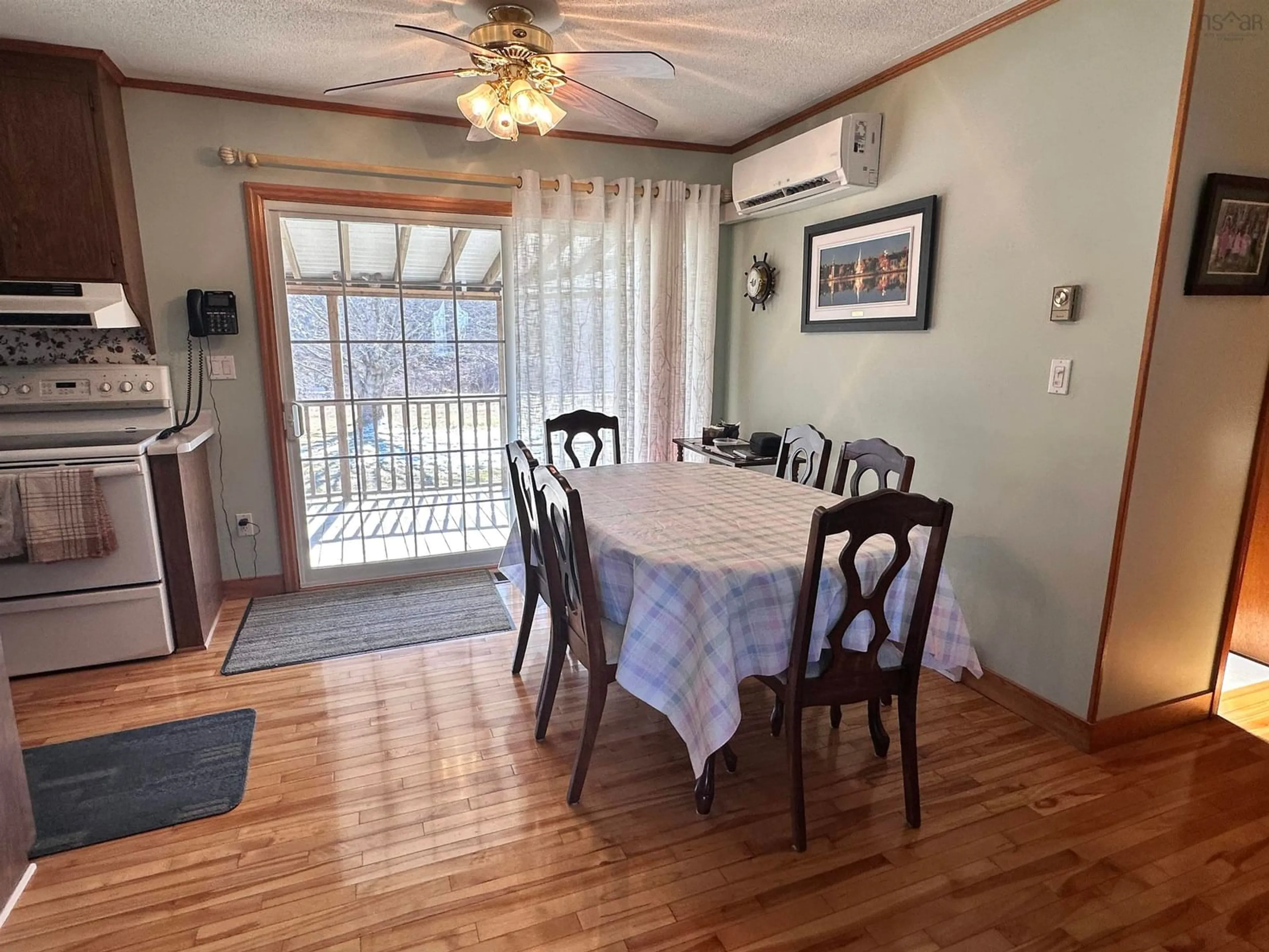 Dining room, wood/laminate floor for 46 Long Cove Rd, Port Medway Nova Scotia B0J 2T0