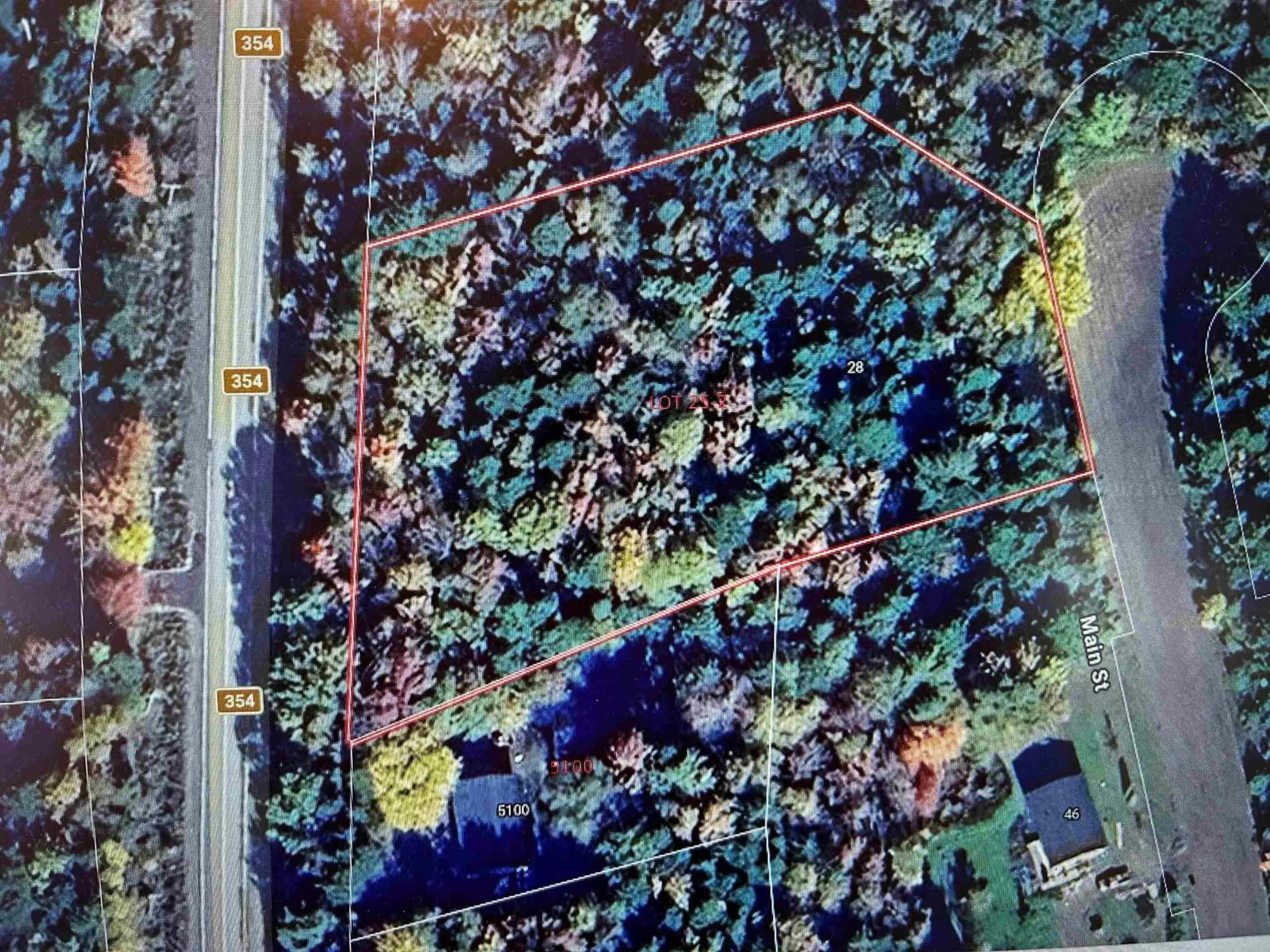 A pic from outside/outdoor area/front of a property/back of a property/a pic from drone, forest/trees view for 28 Main St, Gore Nova Scotia B0W 2N0