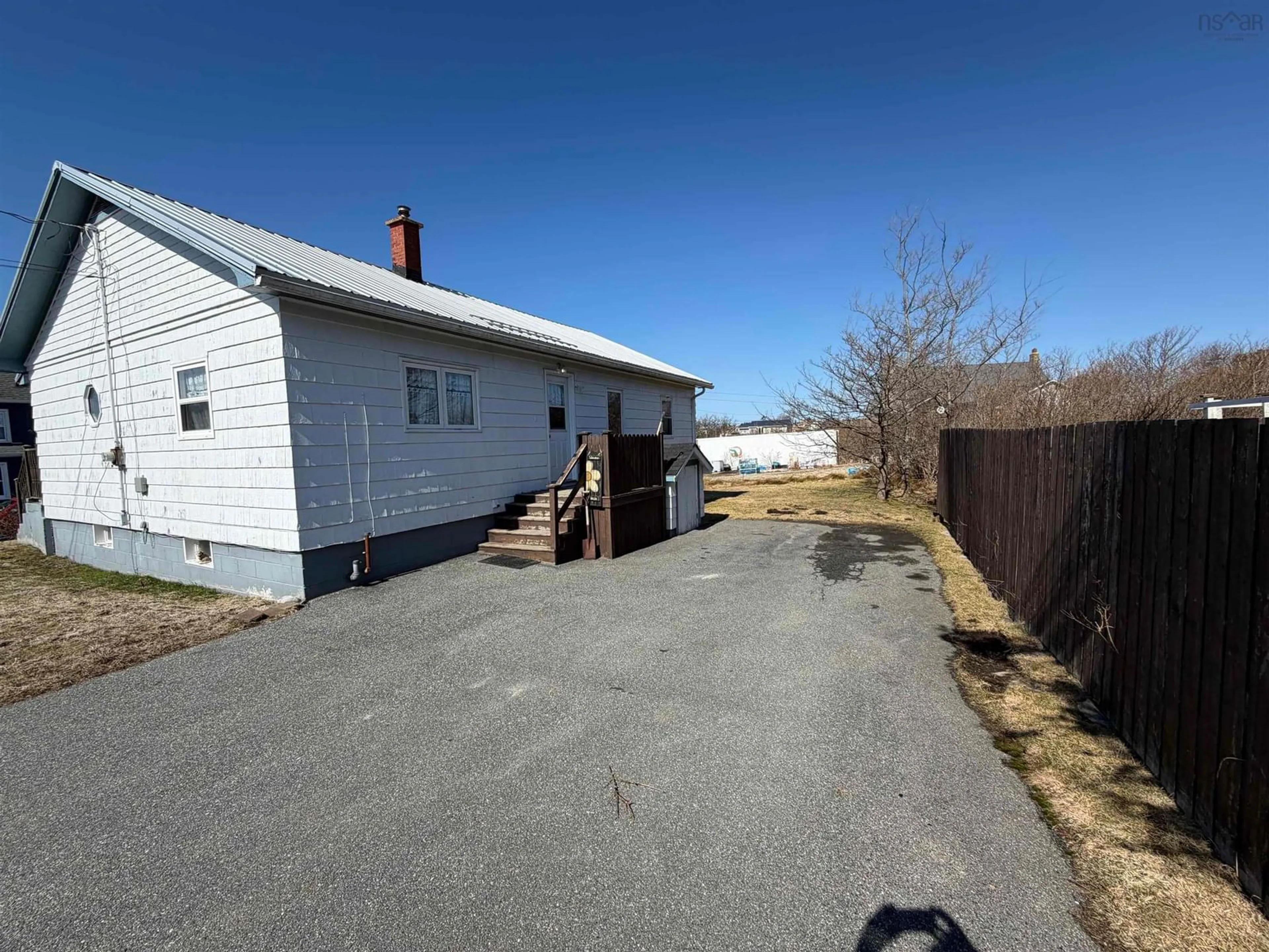 A pic from outside/outdoor area/front of a property/back of a property/a pic from drone, street for 11 Saunders St, Clark's Harbour Nova Scotia B0W 1P0