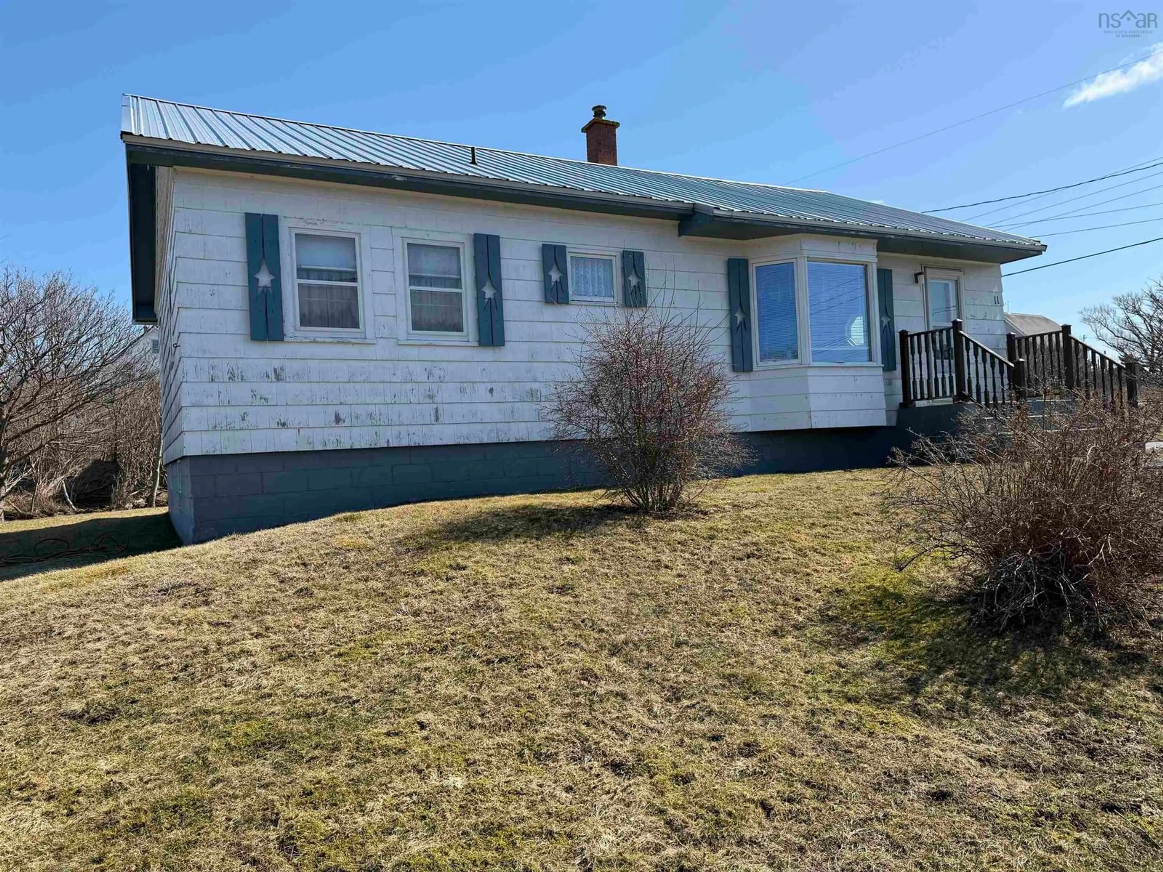 A pic from outside/outdoor area/front of a property/back of a property/a pic from drone, building for 11 Saunders St, Clark's Harbour Nova Scotia B0W 1P0