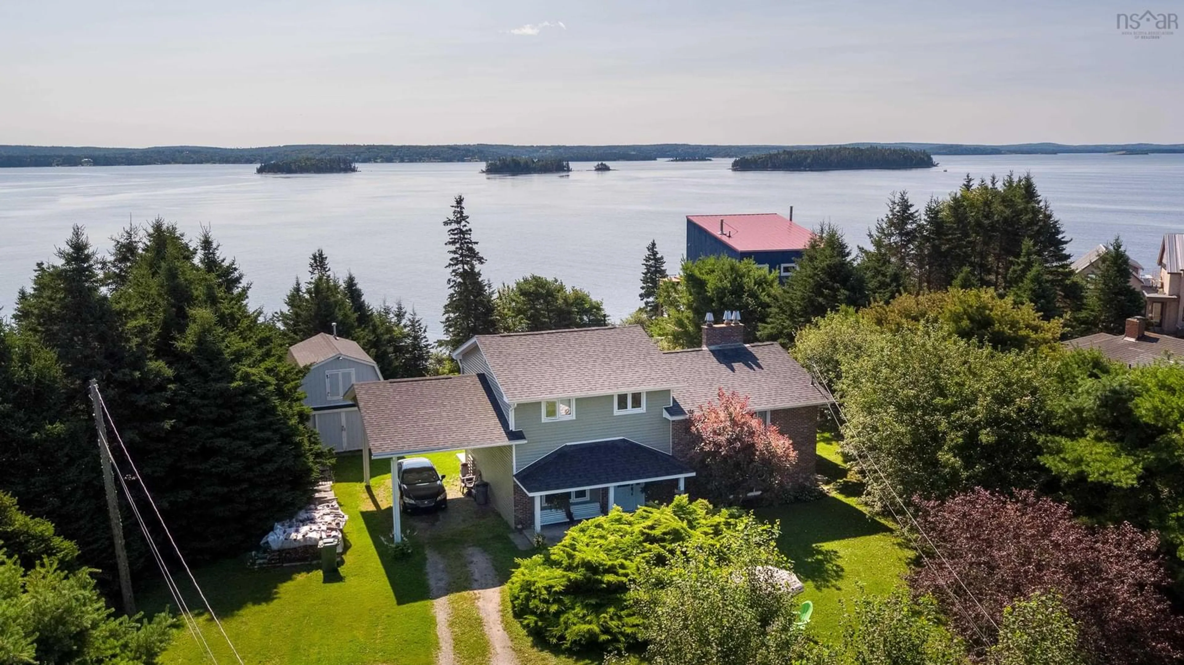 A pic from outside/outdoor area/front of a property/back of a property/a pic from drone, water/lake/river/ocean view for 100 Meisners Point Rd, Ingramport Nova Scotia B3E 3Z3