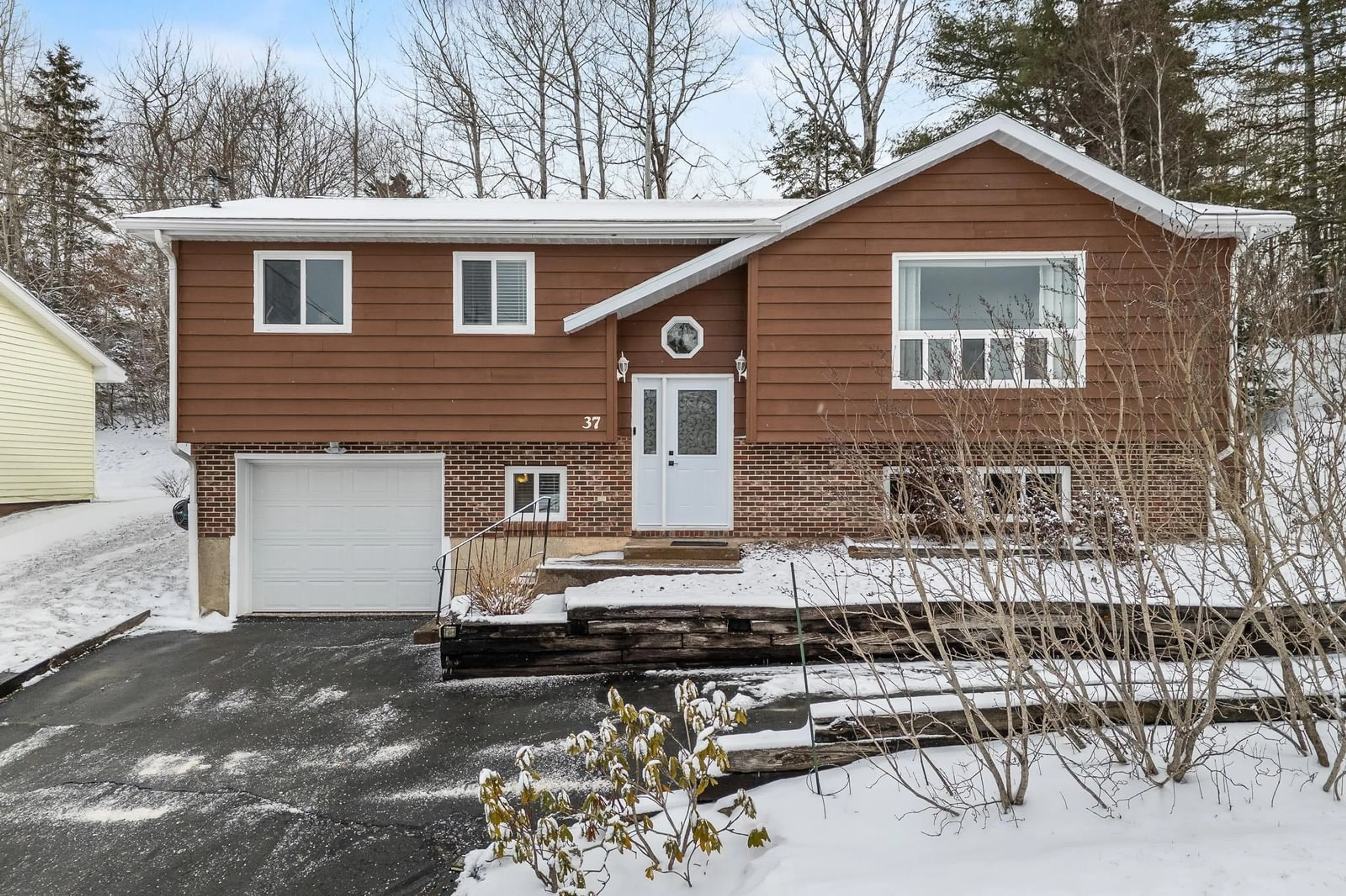 Home with vinyl exterior material, street for 37 Hillcrest Ave, Lower Sackville Nova Scotia B4C 1X2