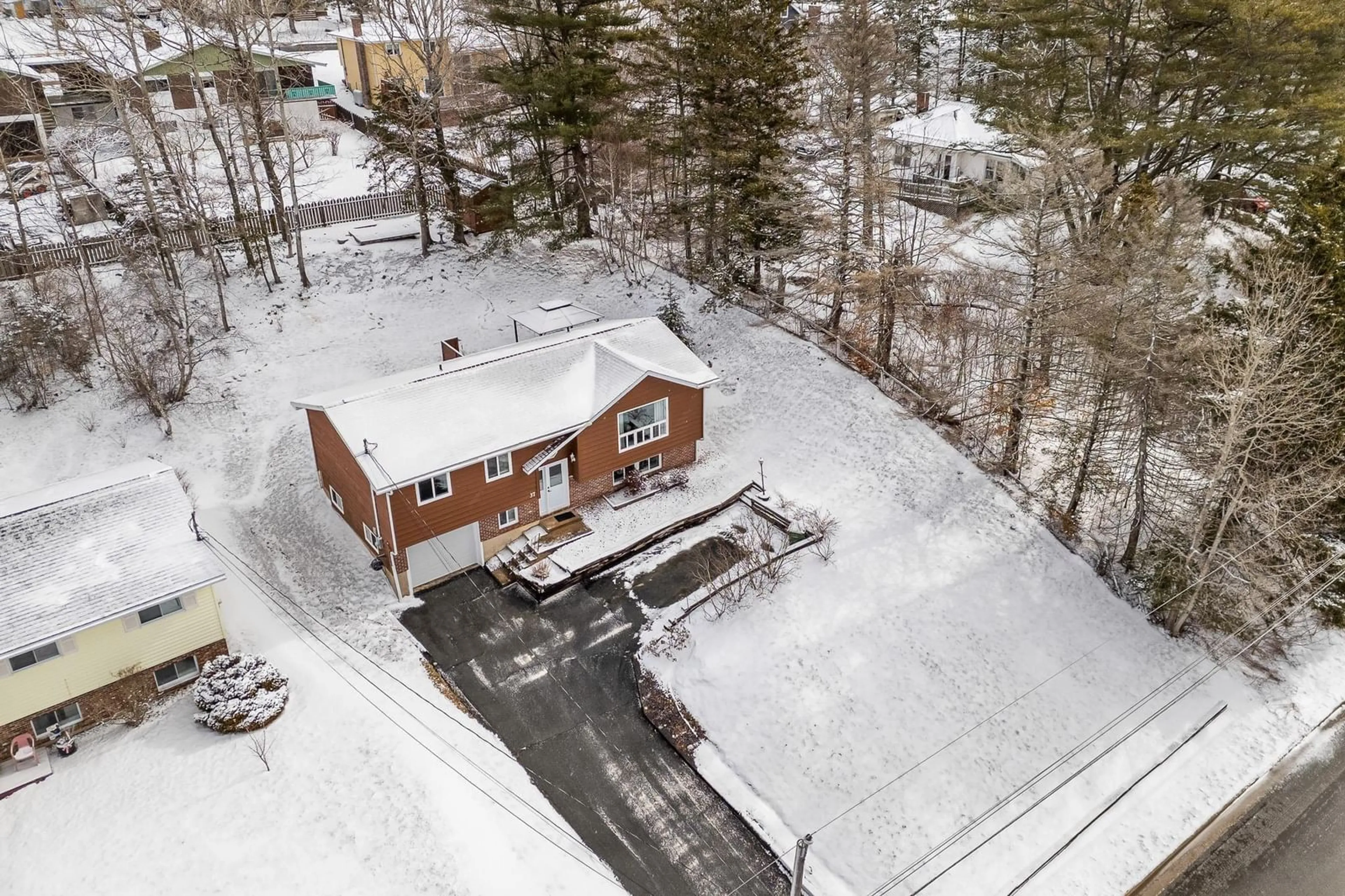 A pic from outside/outdoor area/front of a property/back of a property/a pic from drone, street for 37 Hillcrest Ave, Lower Sackville Nova Scotia B4C 1X2