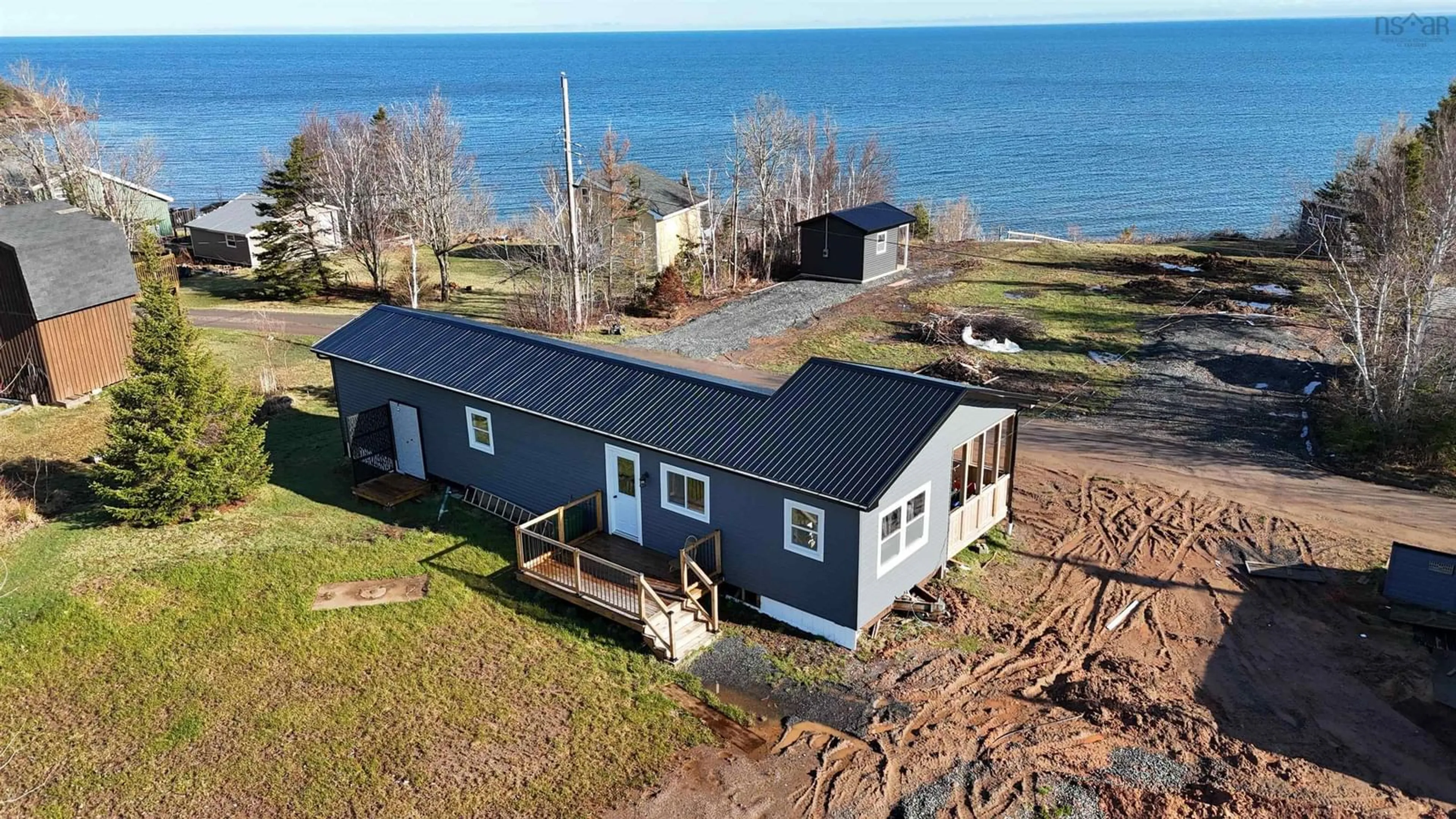A pic from outside/outdoor area/front of a property/back of a property/a pic from drone, water/lake/river/ocean view for 124 Red Cliff Dr, Seafoam Nova Scotia B0K 1H0