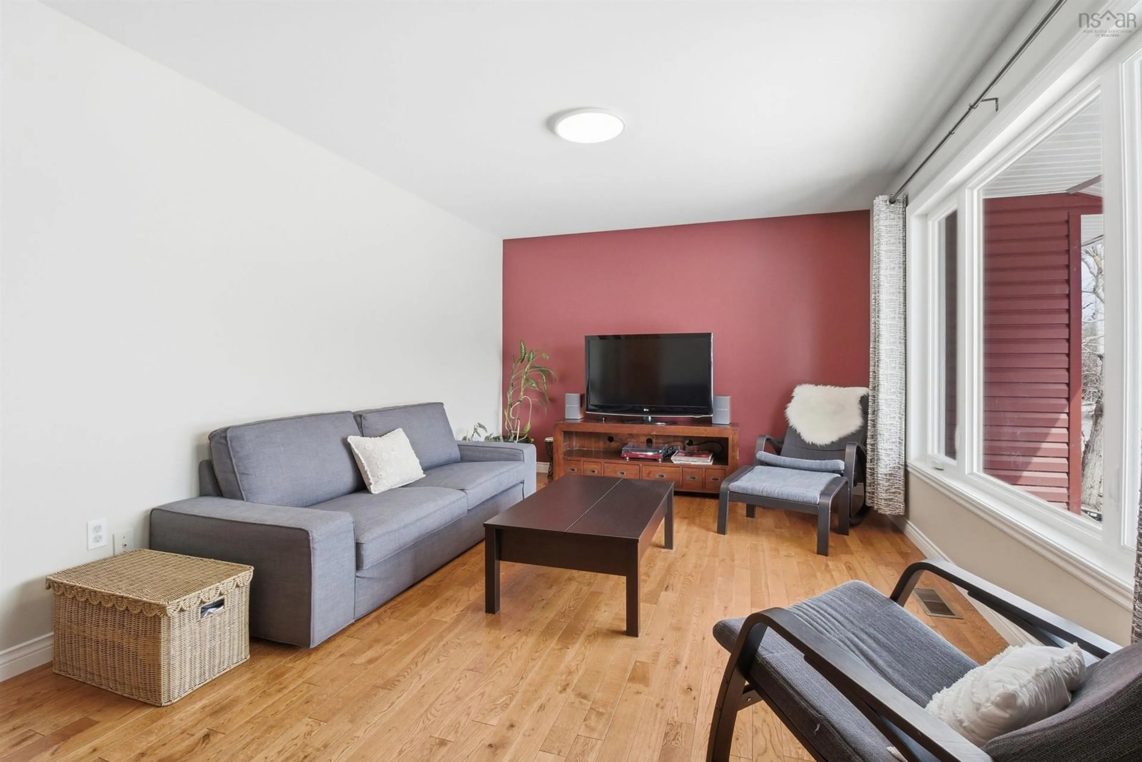Living room with furniture, wood/laminate floor for 17 Sprucewood Ave, Timberlea Nova Scotia B3T 1C1