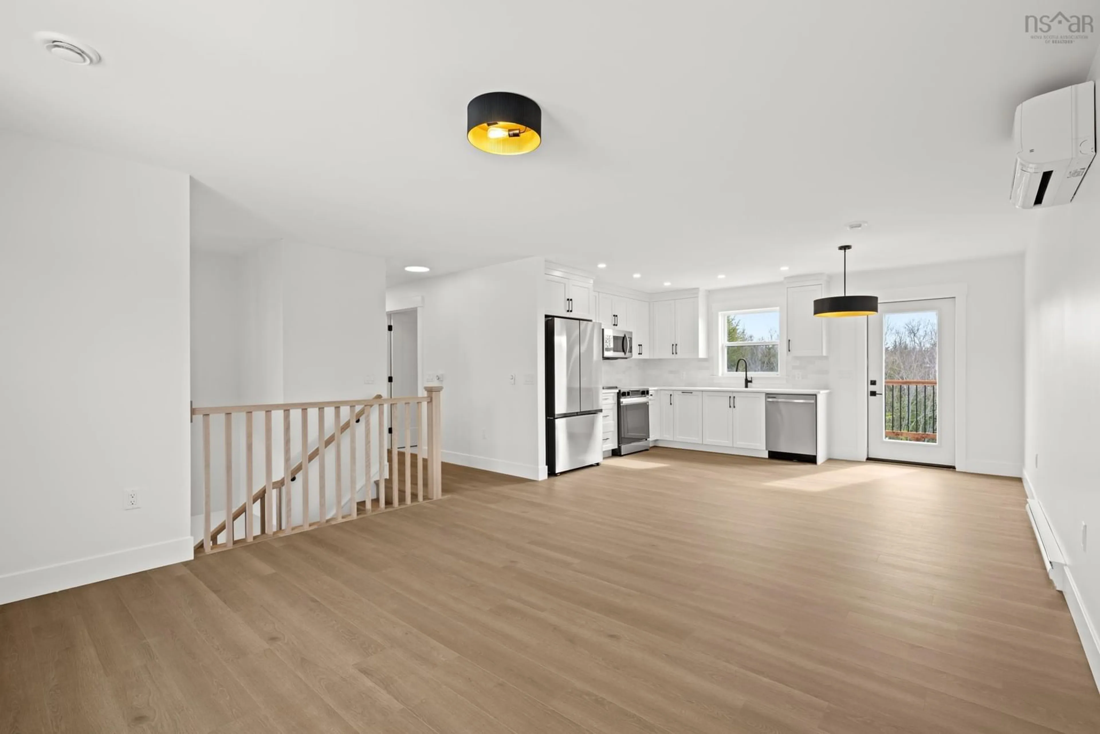 Open concept kitchen, wood/laminate floor for 11 Maverick Lane, Devon Nova Scotia B2T 1K8
