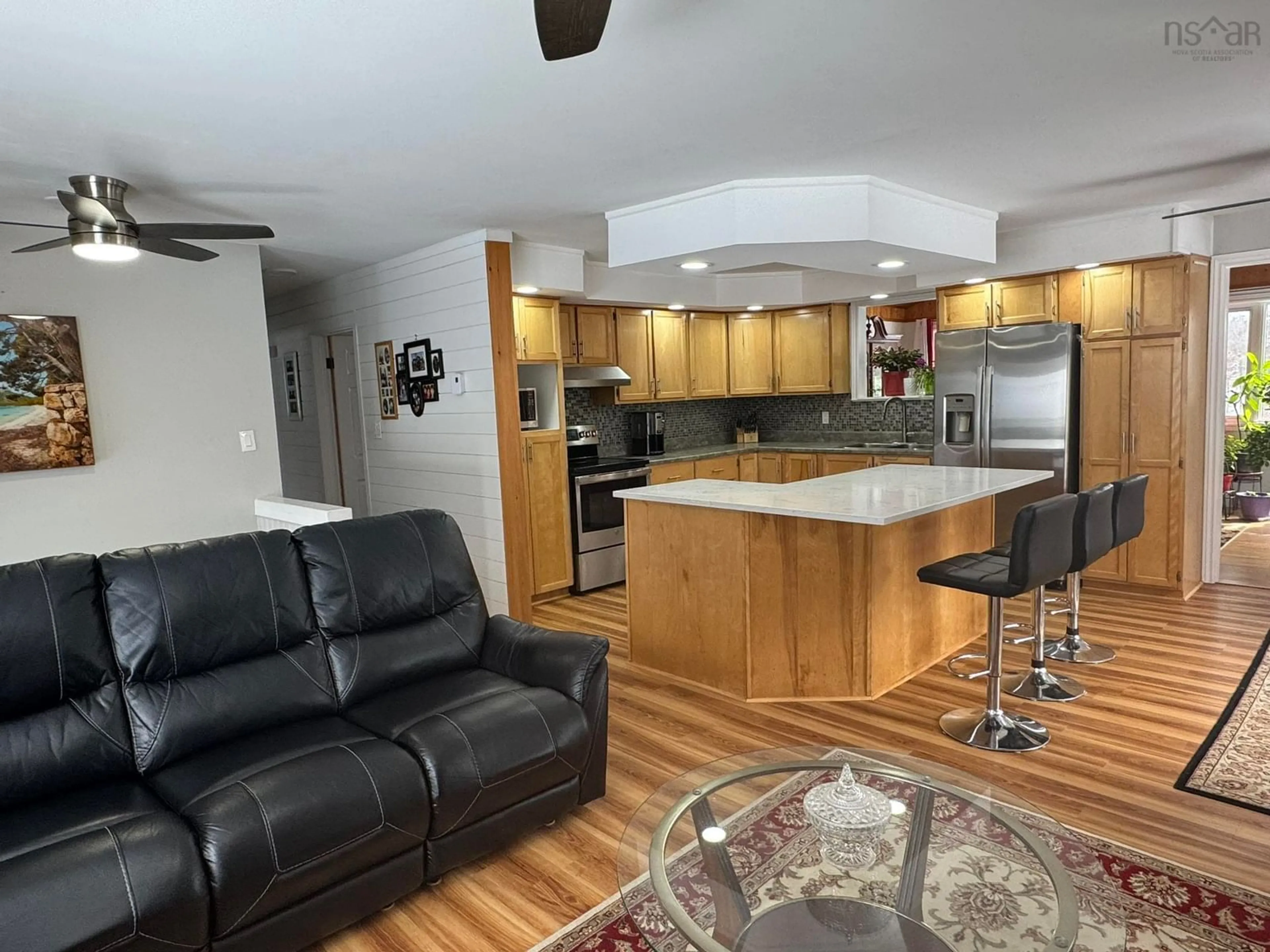 Open concept kitchen, wood/laminate floor for 78 Birch Dr, Meadowvale Nova Scotia B0P 1R0