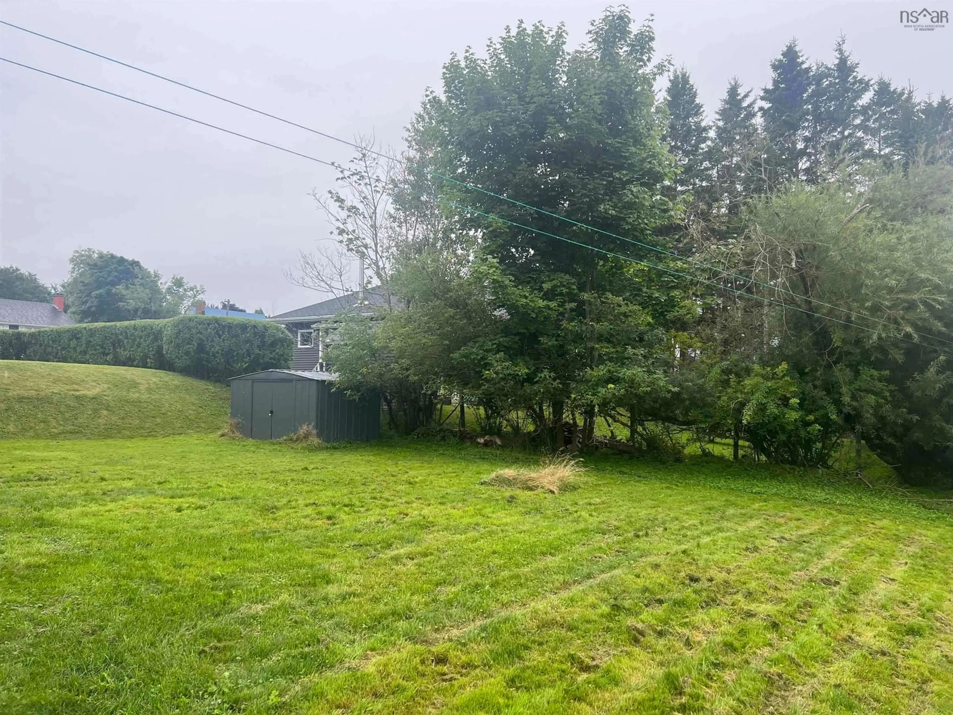A pic from outside/outdoor area/front of a property/back of a property/a pic from drone, forest/trees view for 274 Pleasant St, Truro Nova Scotia B2N 3T1